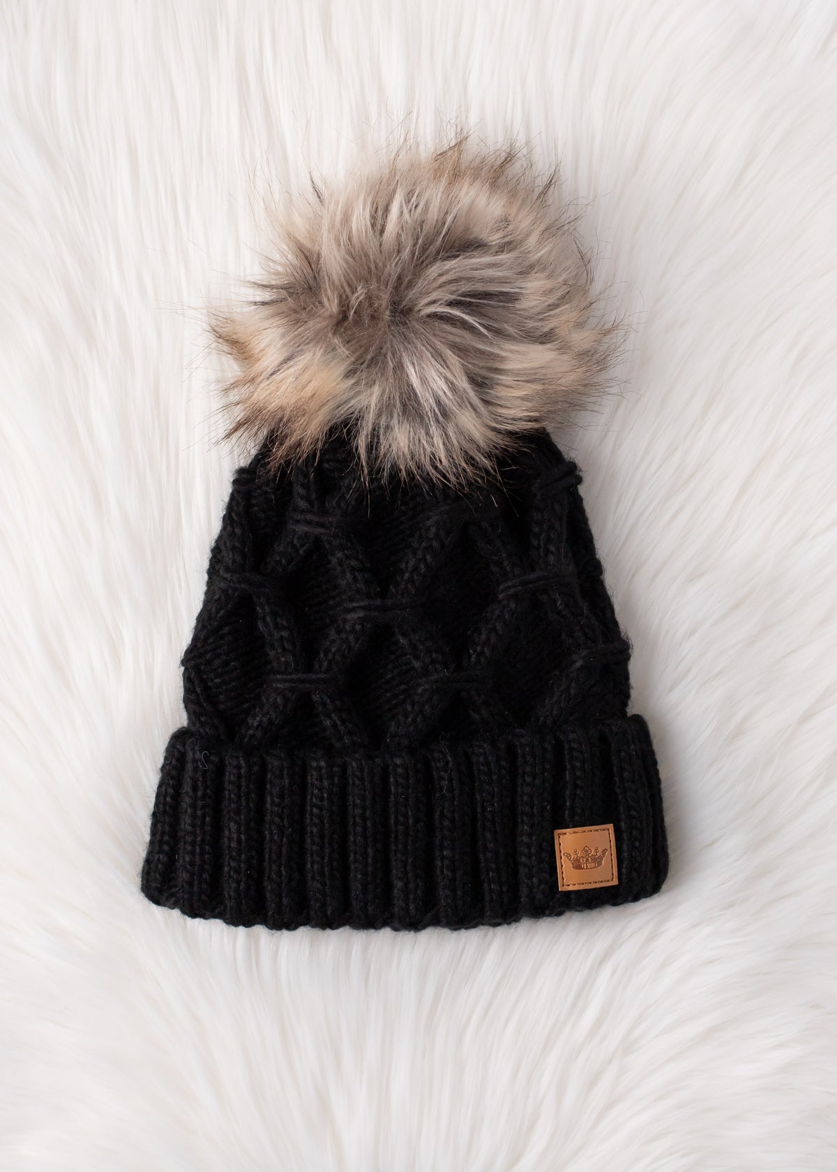 BLACK DIAMOND CABLE KNIT POM HAT