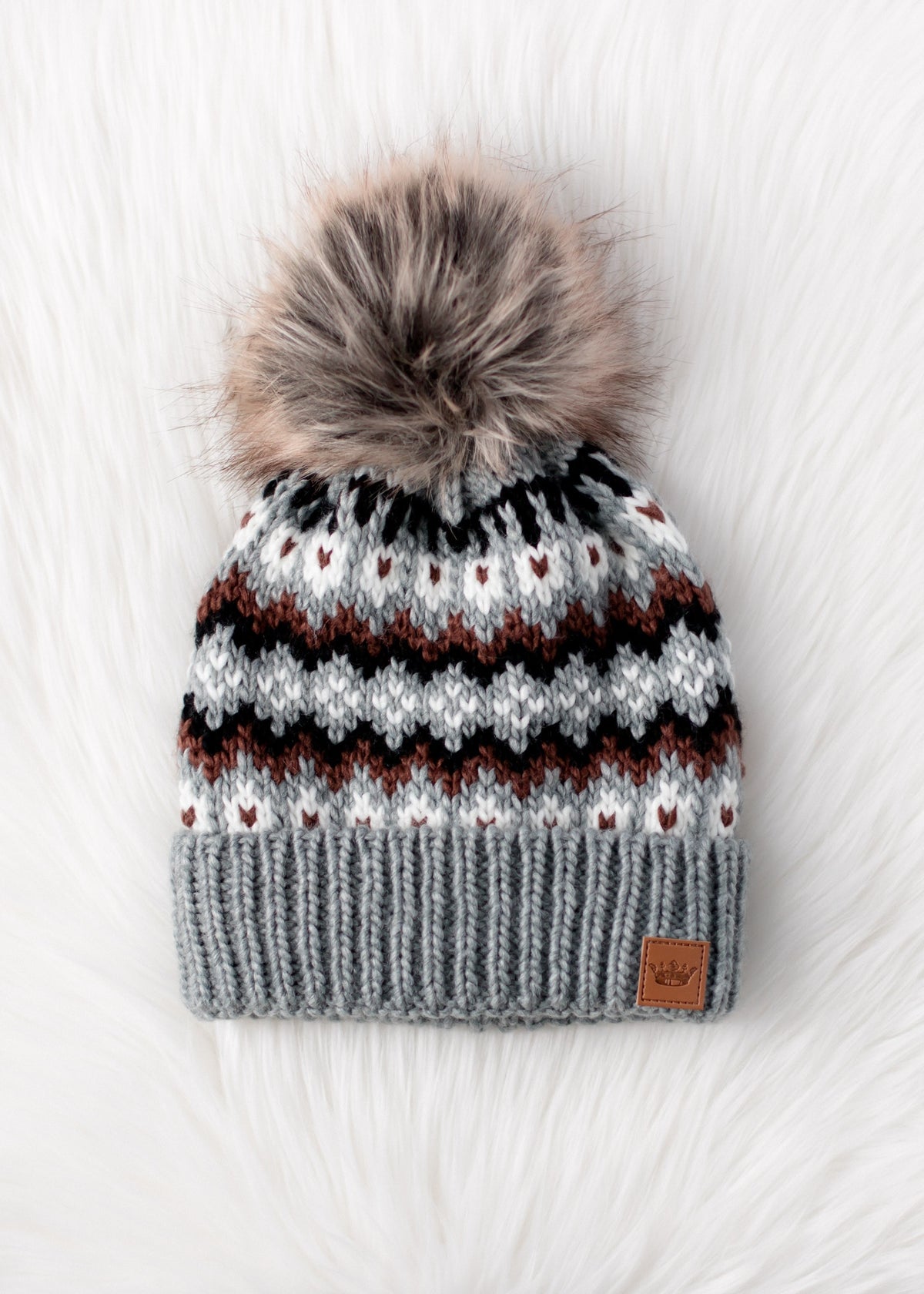 GRAY, BROWN, AND WHITE PATTERNED HAT