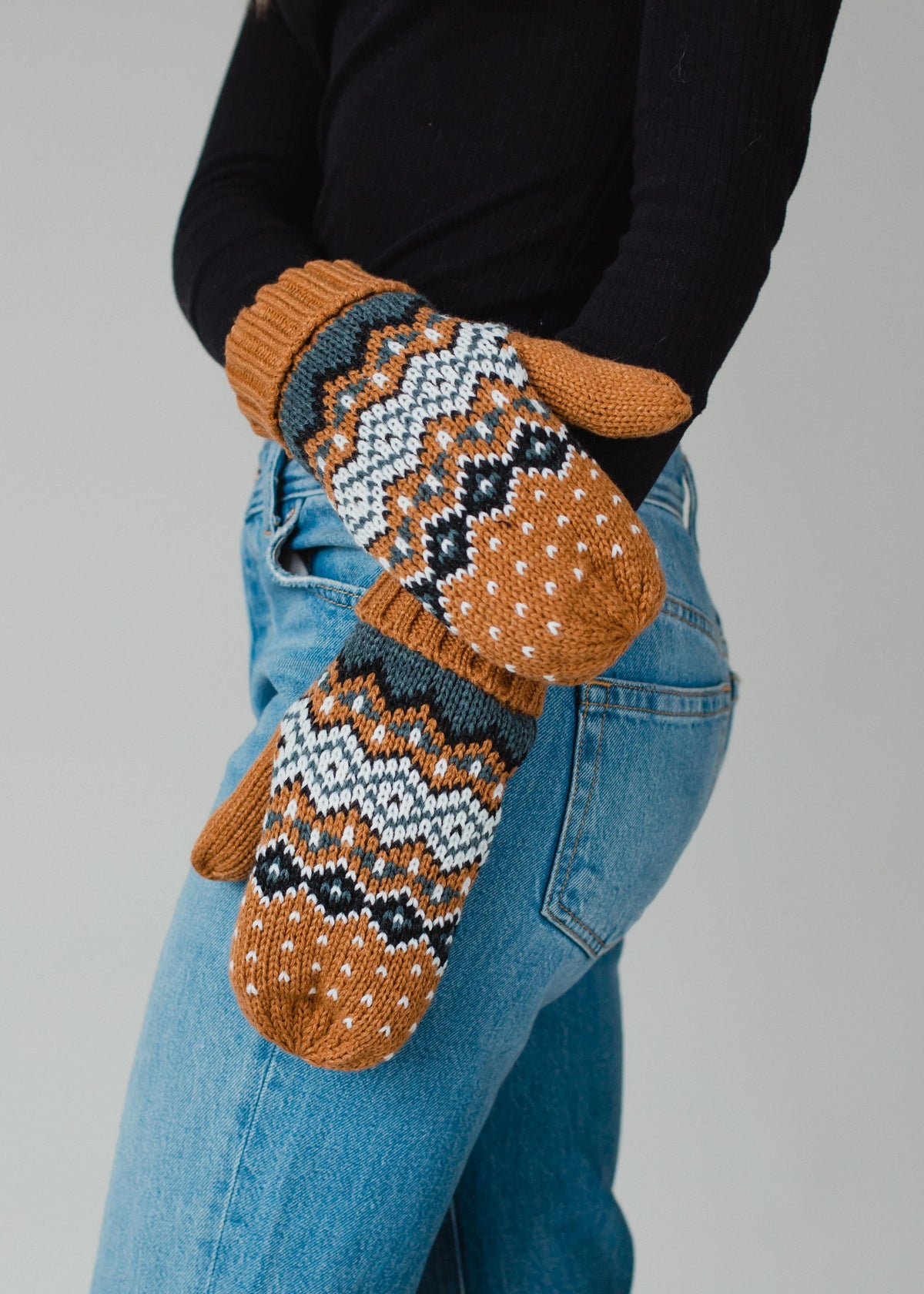 CAMEL, BLACK, AND WHITE PATTERNED MITTENS