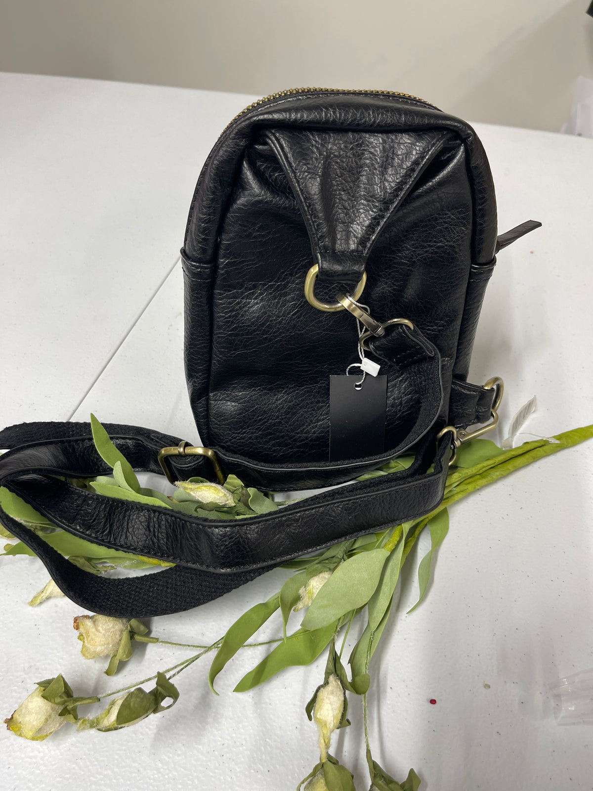 BLACK SKYLER SLING BAG