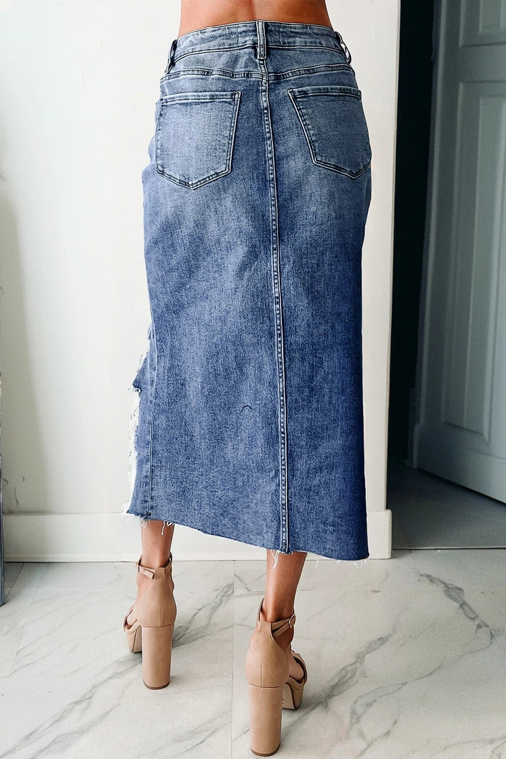 DENIM SKIRT WITH DISTRESSED HEM