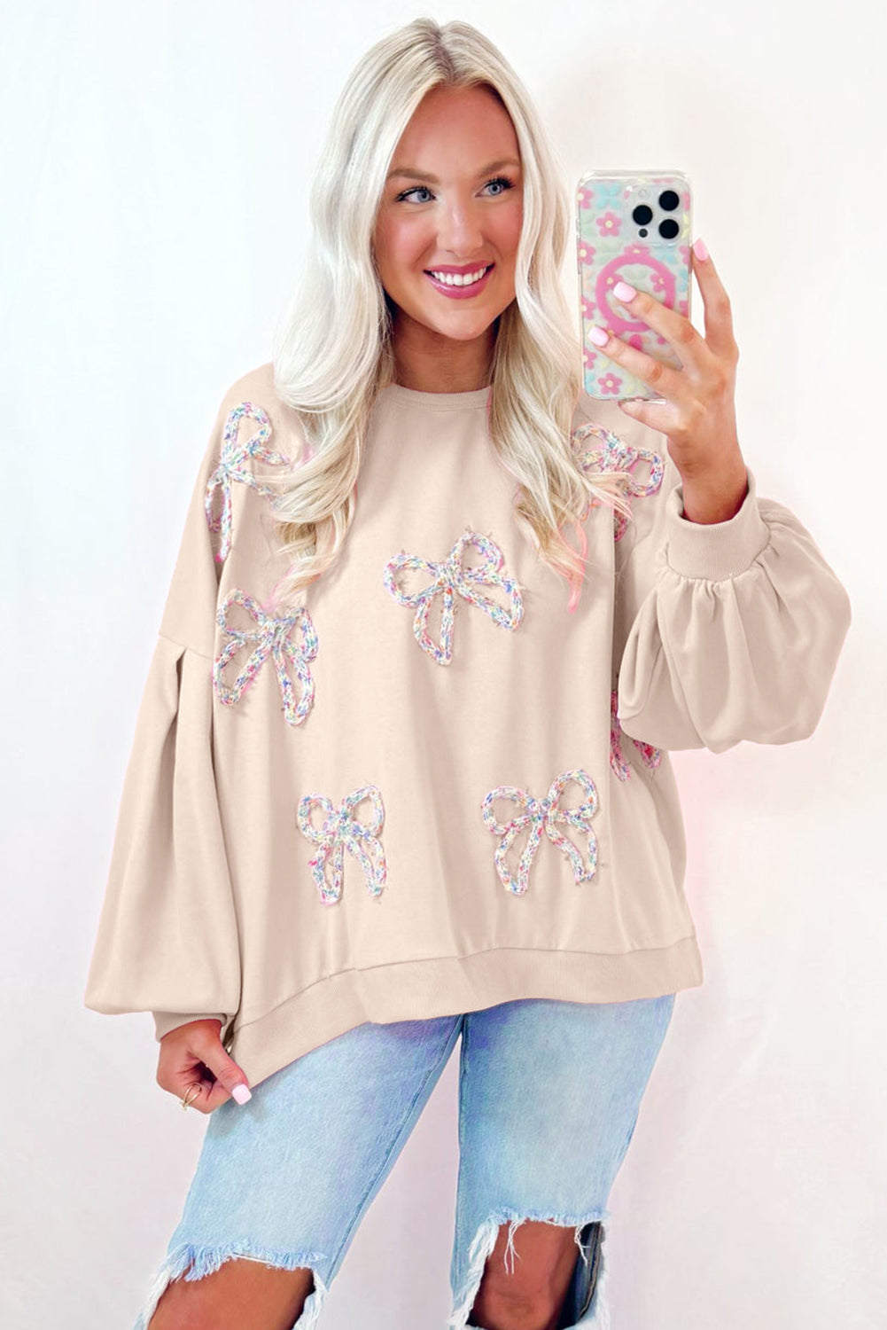 CREAM PULLOVER SWEATSHIRT W/ MULTI COLOR KNIT BOWS