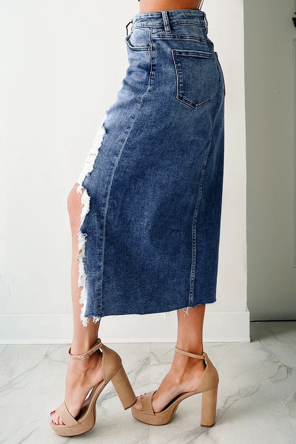 DENIM SKIRT WITH DISTRESSED HEM
