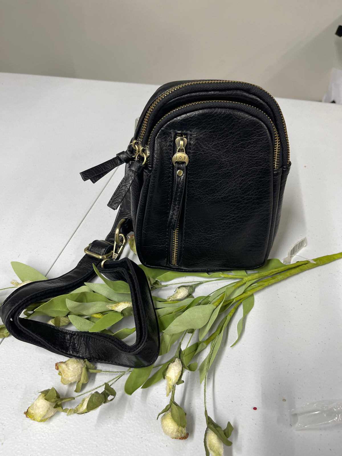 BLACK SKYLER SLING BAG