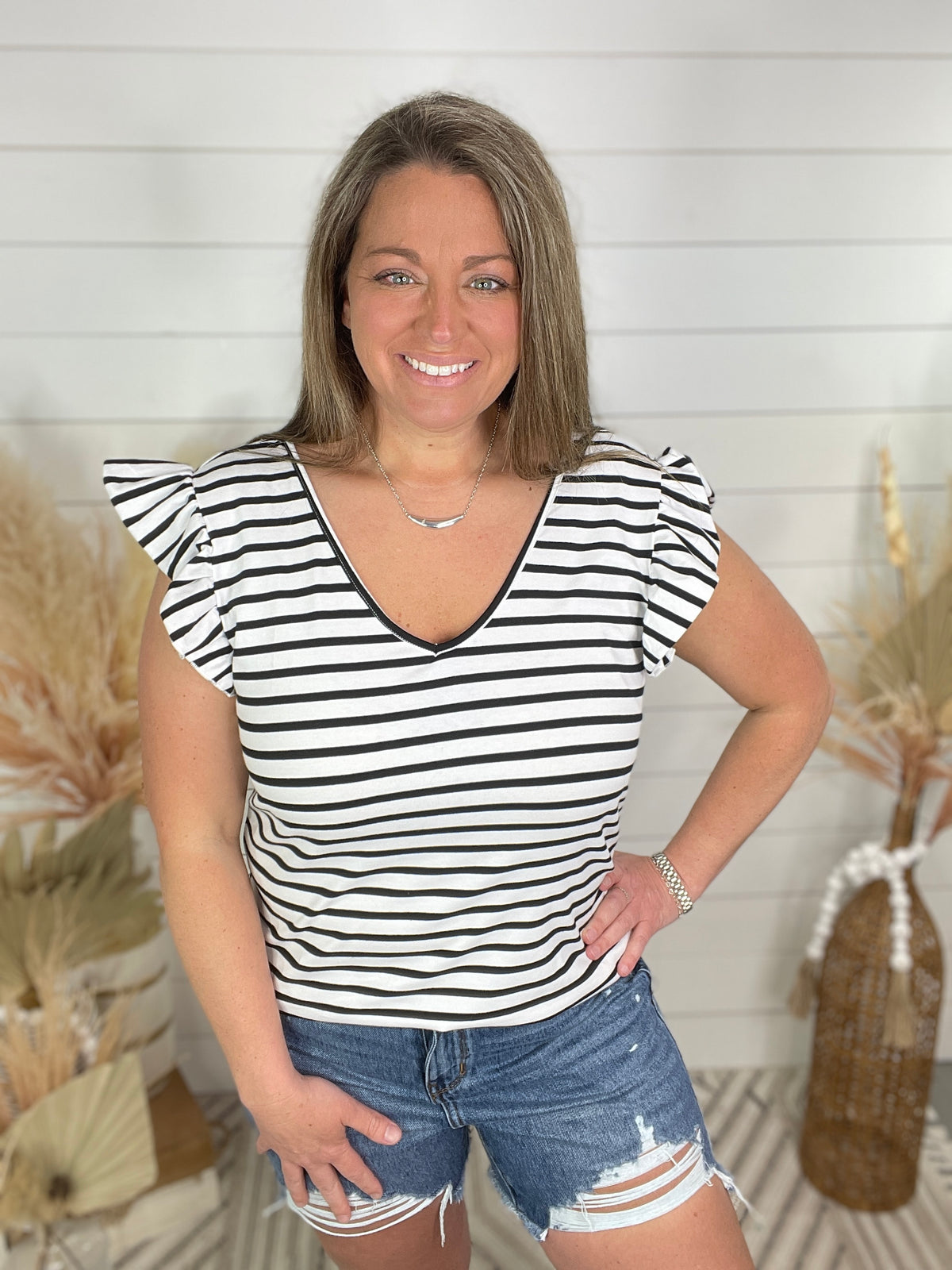 BLACK/WHITE STRIPED TIE BACK TOP WITH RUFFLE SLEEVE