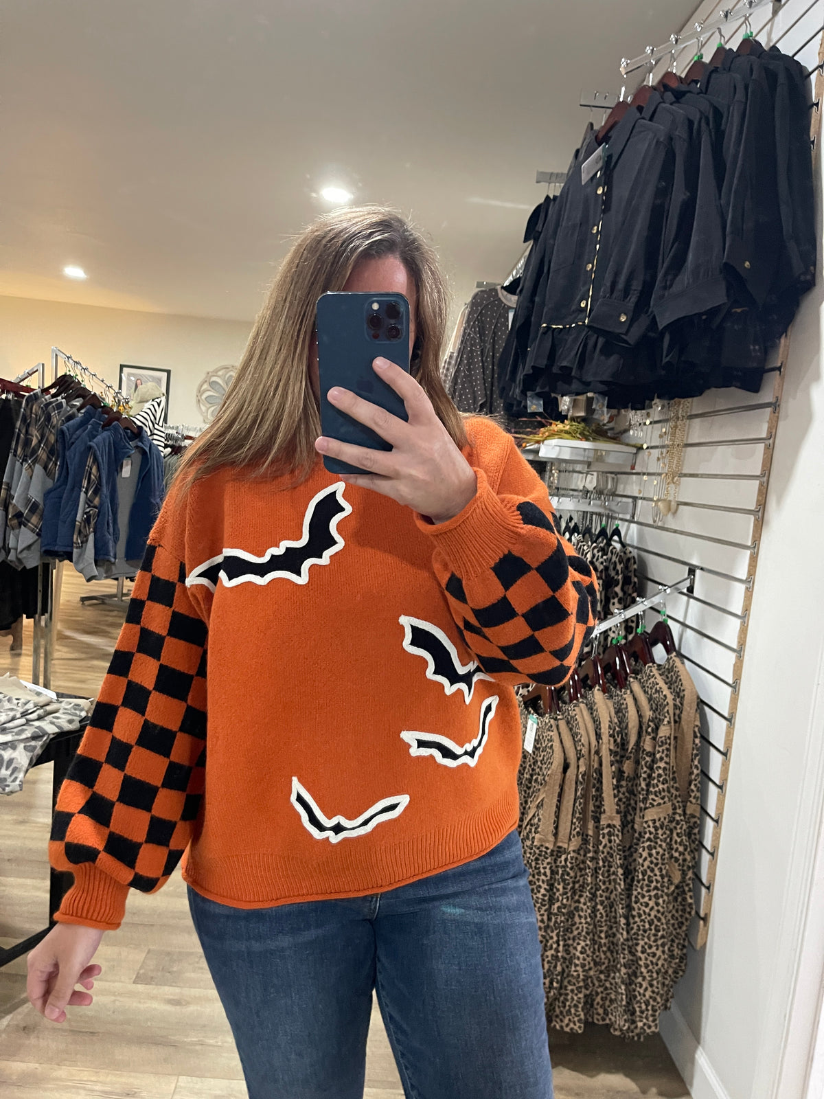 ORANGE CHECKERED BAT SWEATER