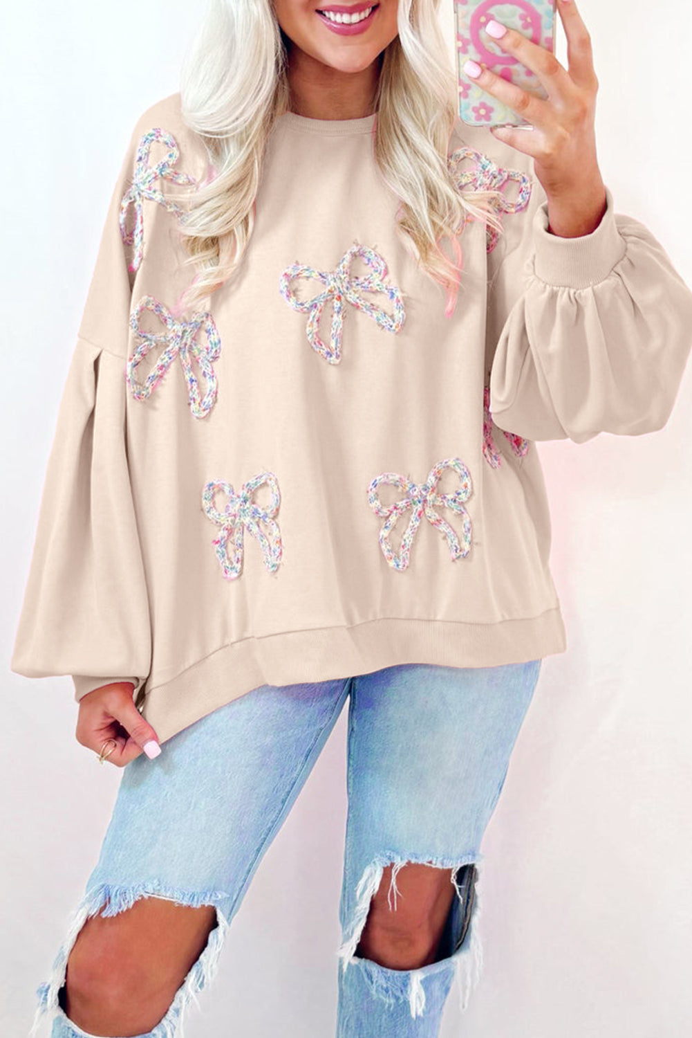 CREAM PULLOVER SWEATSHIRT W/ MULTI COLOR KNIT BOWS