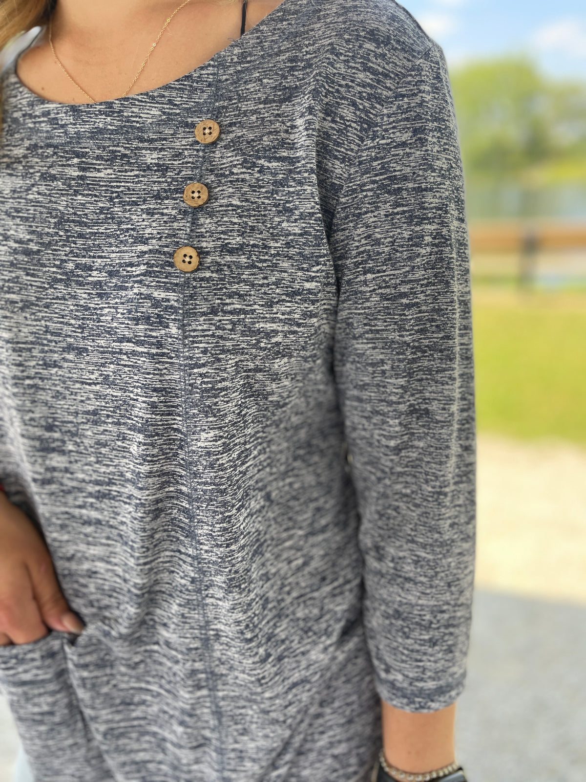 HEATHERED NAVY KNIT TOP W/ POCKET AND BUTTON