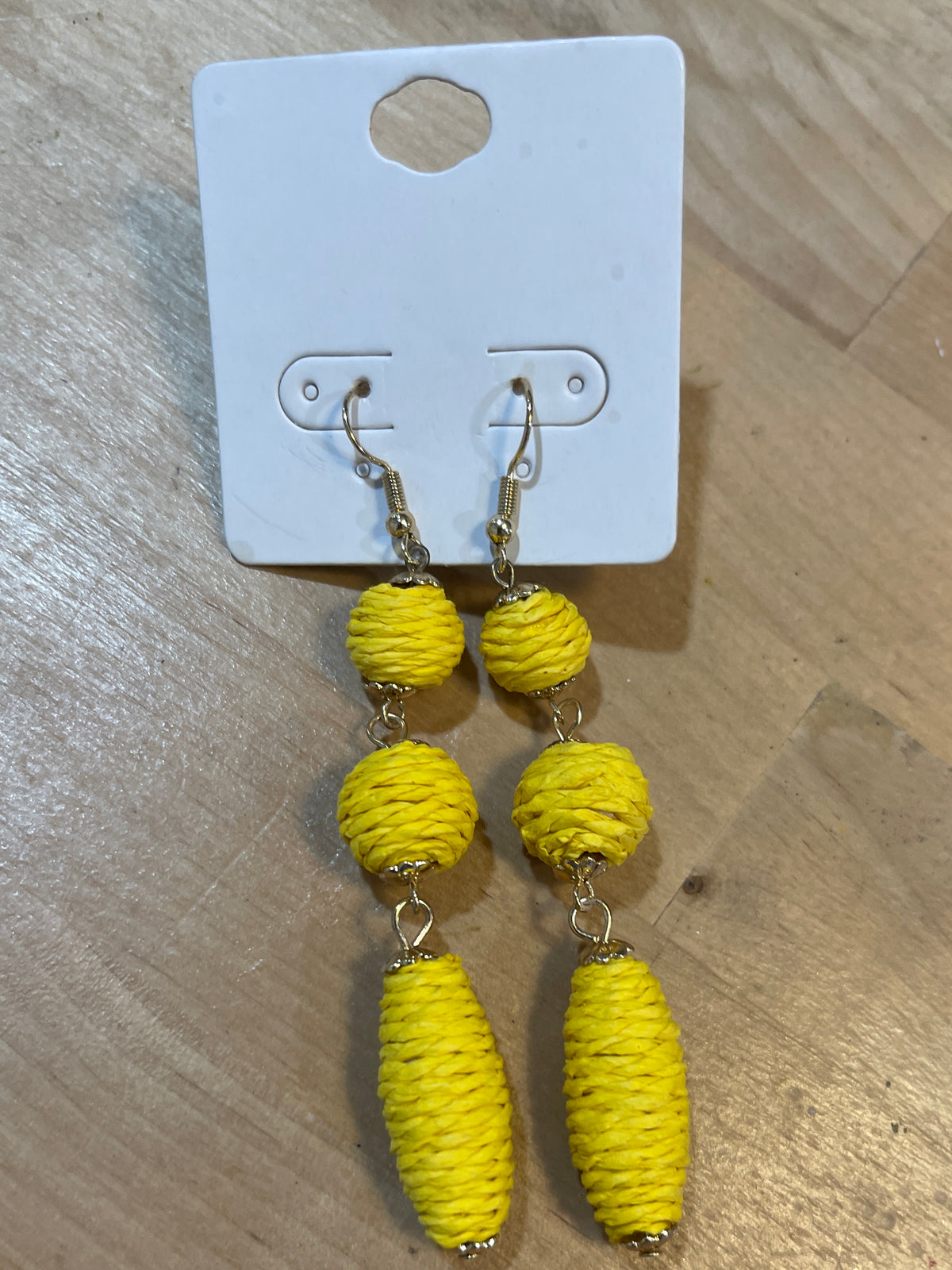 YELLOW DANGLE RATTAN EARRINGS