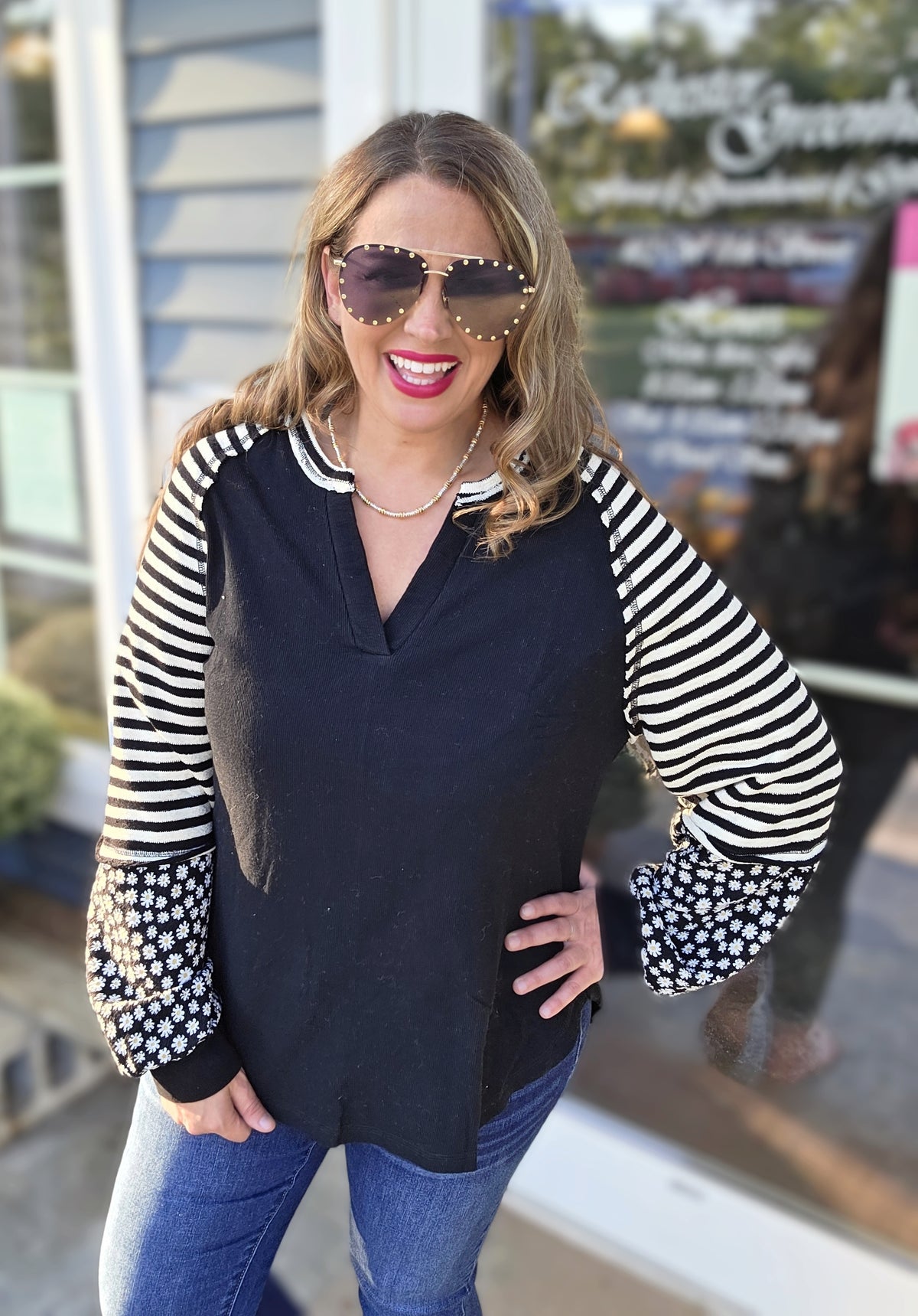 BLACK COTTON TOP W/ CONTRAST STRIPED AND FLORAL SLEEVES