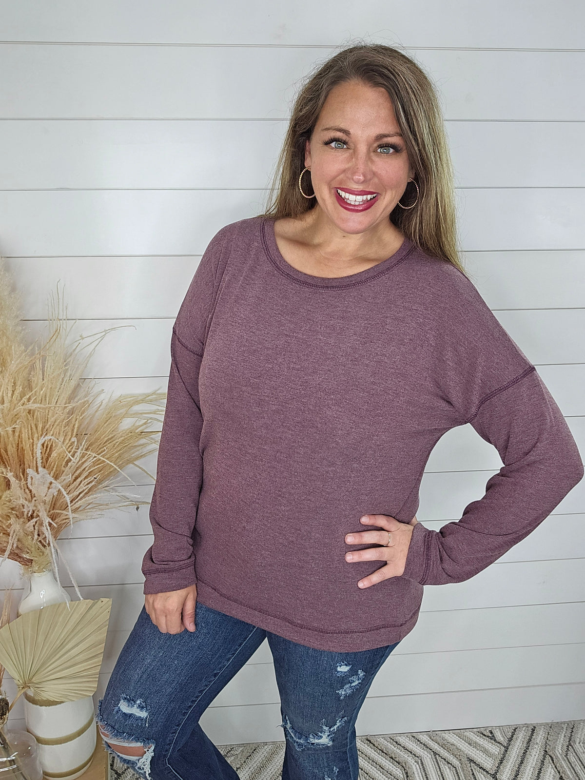 PLUM EXPOSED SEAM KNIT TOP