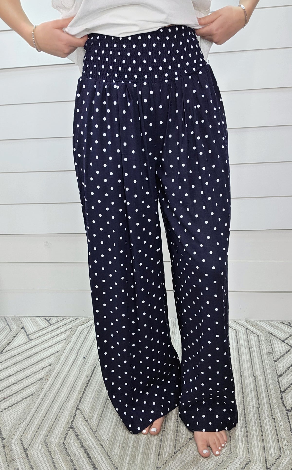 NAVY SMOCKED WAIST WIDE LEG POLKADOT PANT