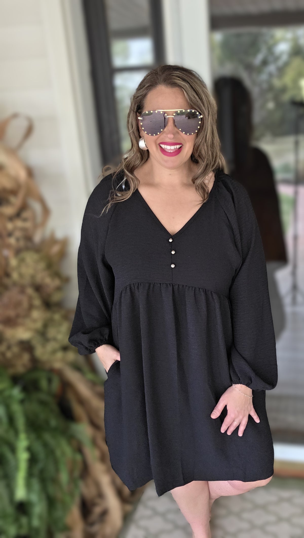 BLACK BABYDOLL KNEE LENGTH TEXTURED DRESS