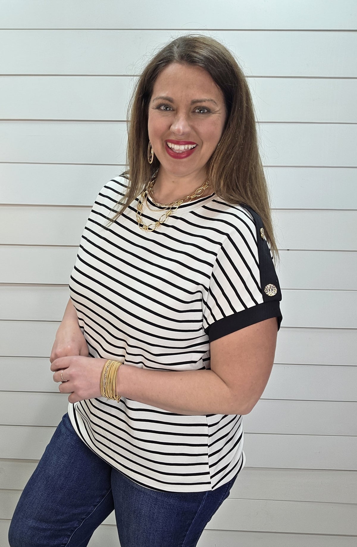 BLACK/WHITE STRIPED KNIT TOP W/ BUTTON SLEEVE DETAILS