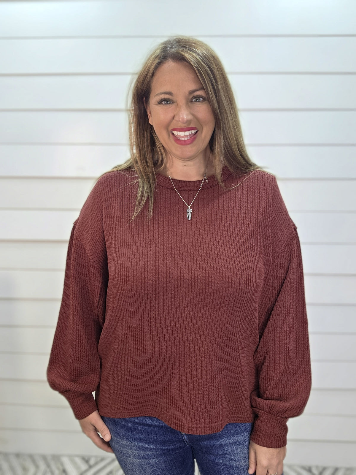 BURGUNDY TEXTURED EXPOSED SEAM LONG SLEEVE KNIT TOP