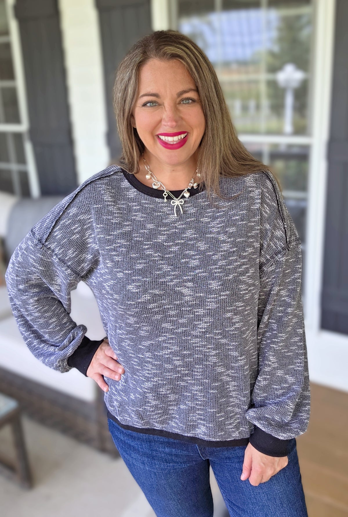 HEATHERED BLACK DROP SHOULDER KNIT TOP