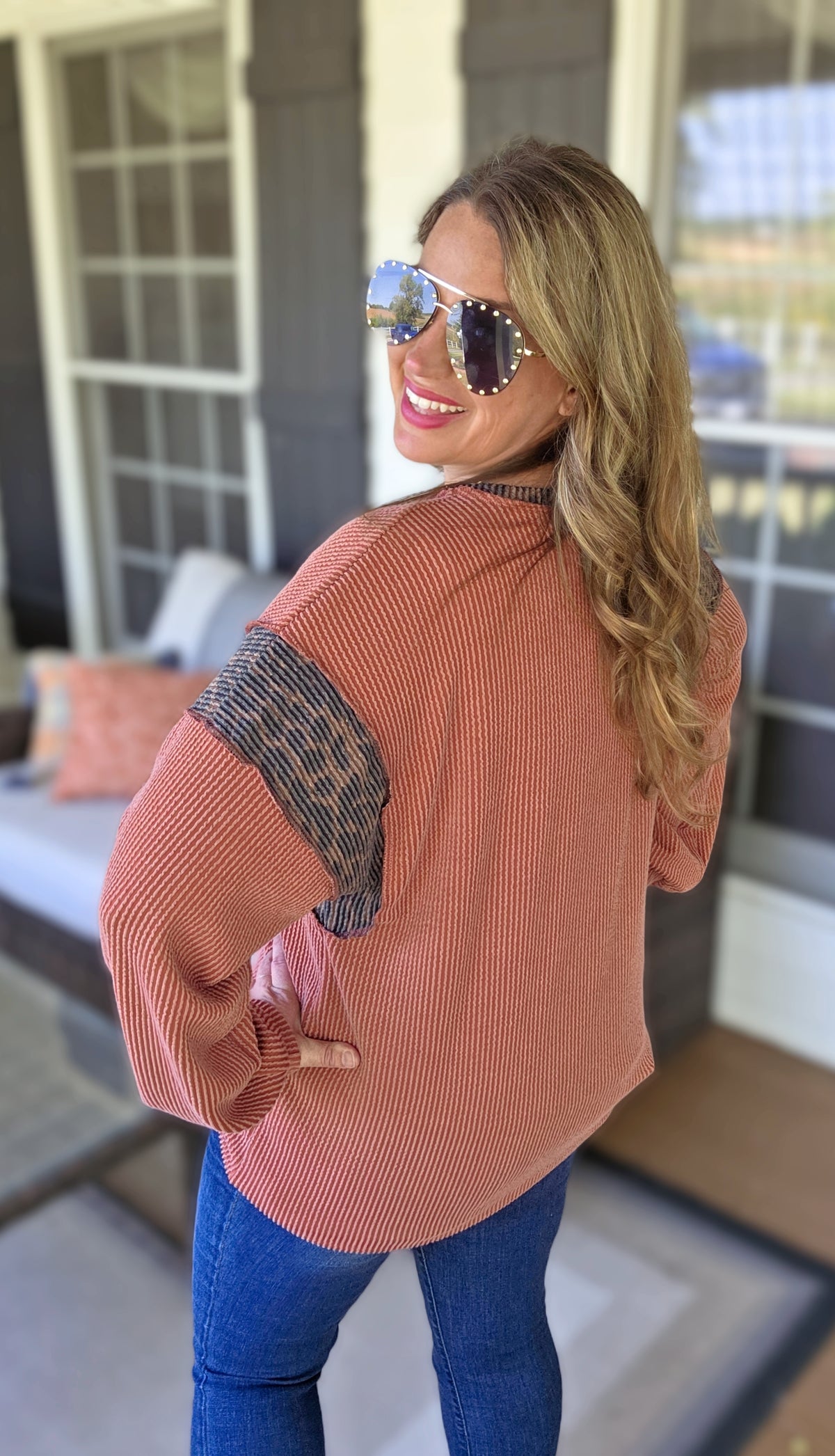 RUST RAISED RIBBED KNIT TOP WITH LEOPARD ACCENT SLEEVE