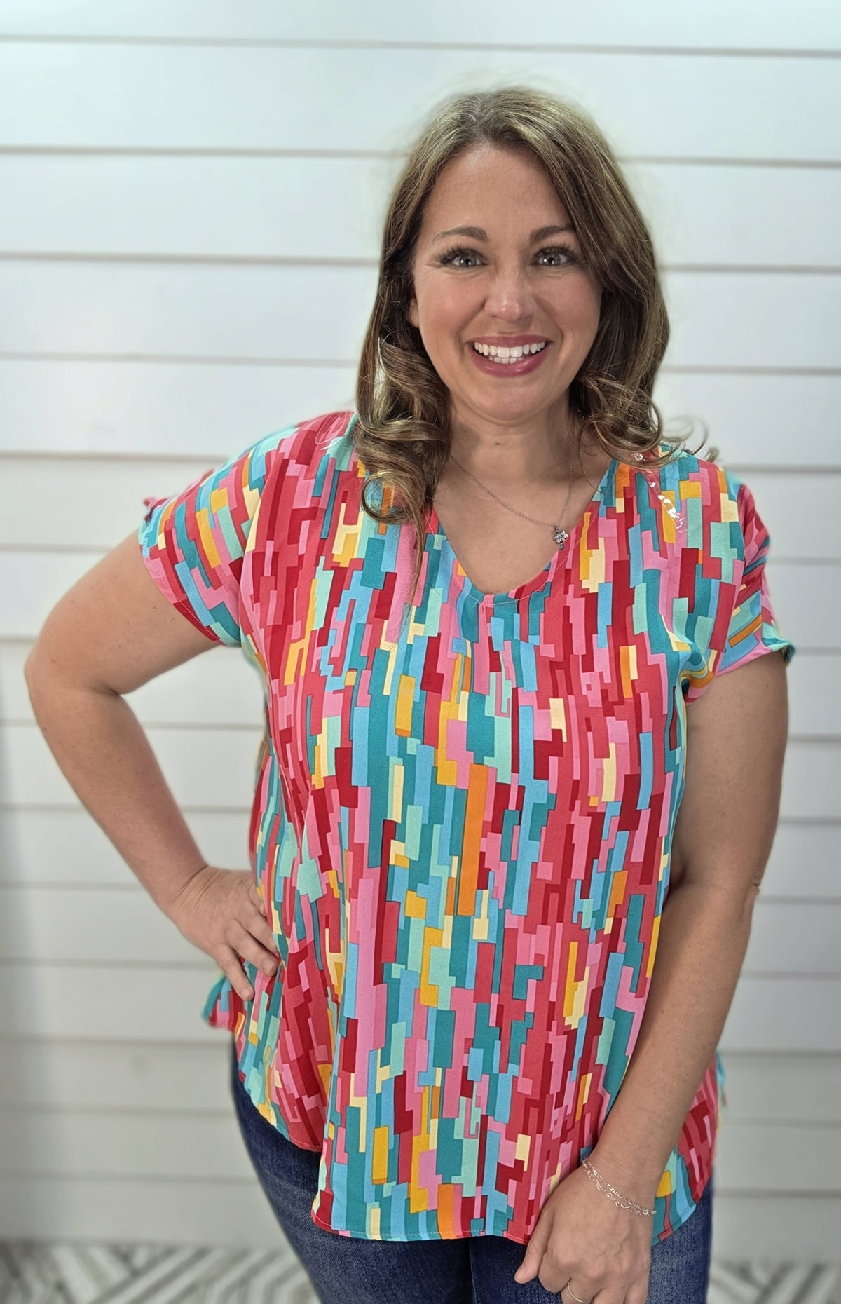 FUCSHIA/TEAL MULTI PRINT V NECK WOVEN TOP
