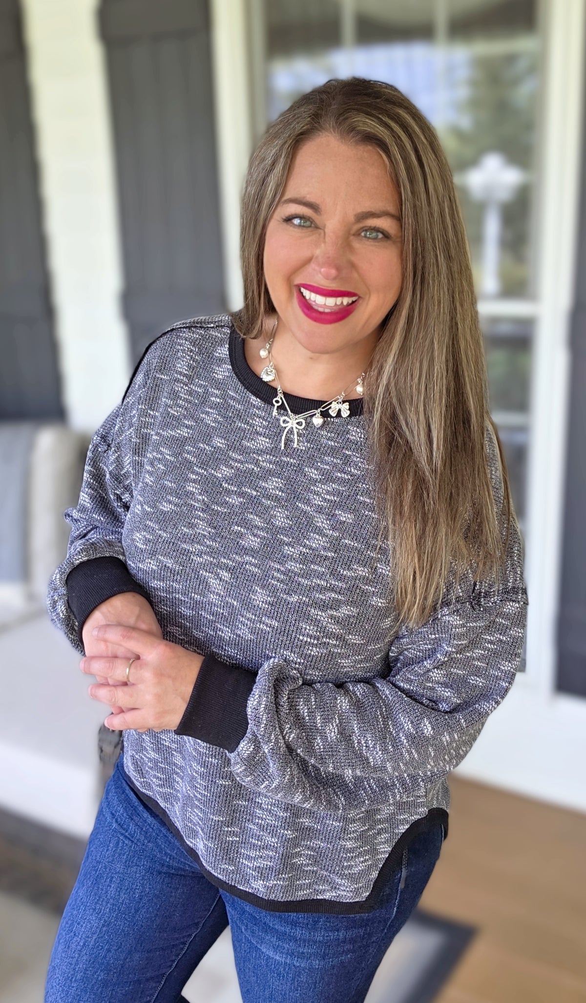 HEATHERED BLACK DROP SHOULDER KNIT TOP