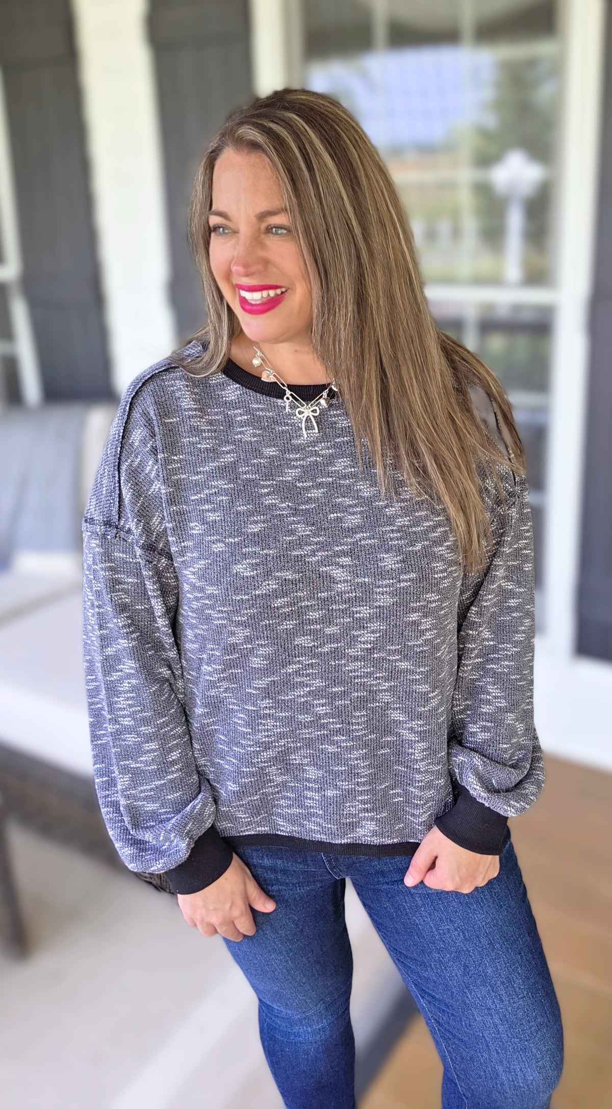 HEATHERED BLACK DROP SHOULDER KNIT TOP
