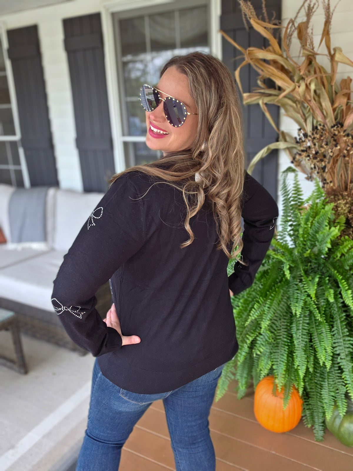 BLACK BOW RHINESTONE BUTTON SWEATER
