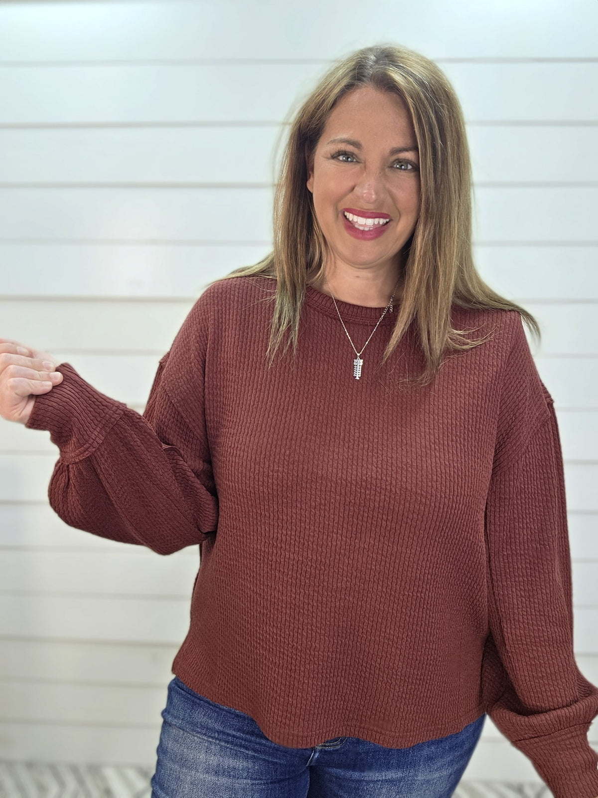 BURGUNDY TEXTURED EXPOSED SEAM LONG SLEEVE KNIT TOP