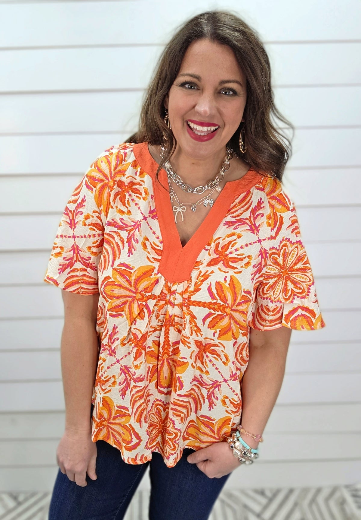 ORANGE FLORAL PRINT TOP W/ Y NECK LINE AND FLUTTER SLEEVE