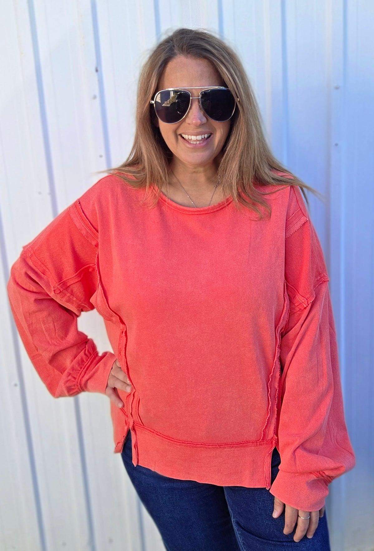 CORAL SOFT FRENCH TERRY PULLOVER WITH SPLIT FRONT AND RAW SEAMS