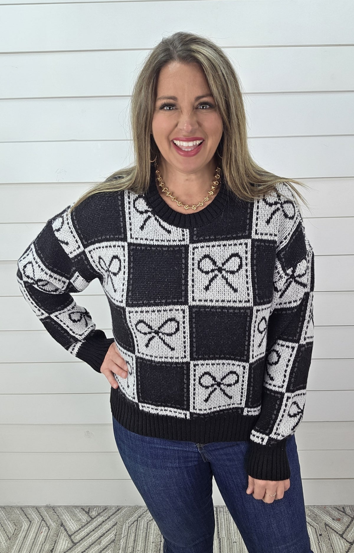 BLACK/CREAM CHECK BOW SWEATER