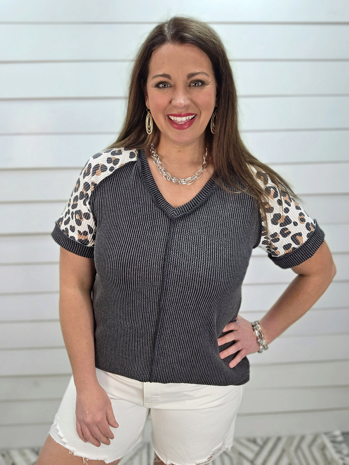 BLACK RAISED RIBBED KNIT TOP W/ LEOPARD SLEEVES AND CENTER SEAM