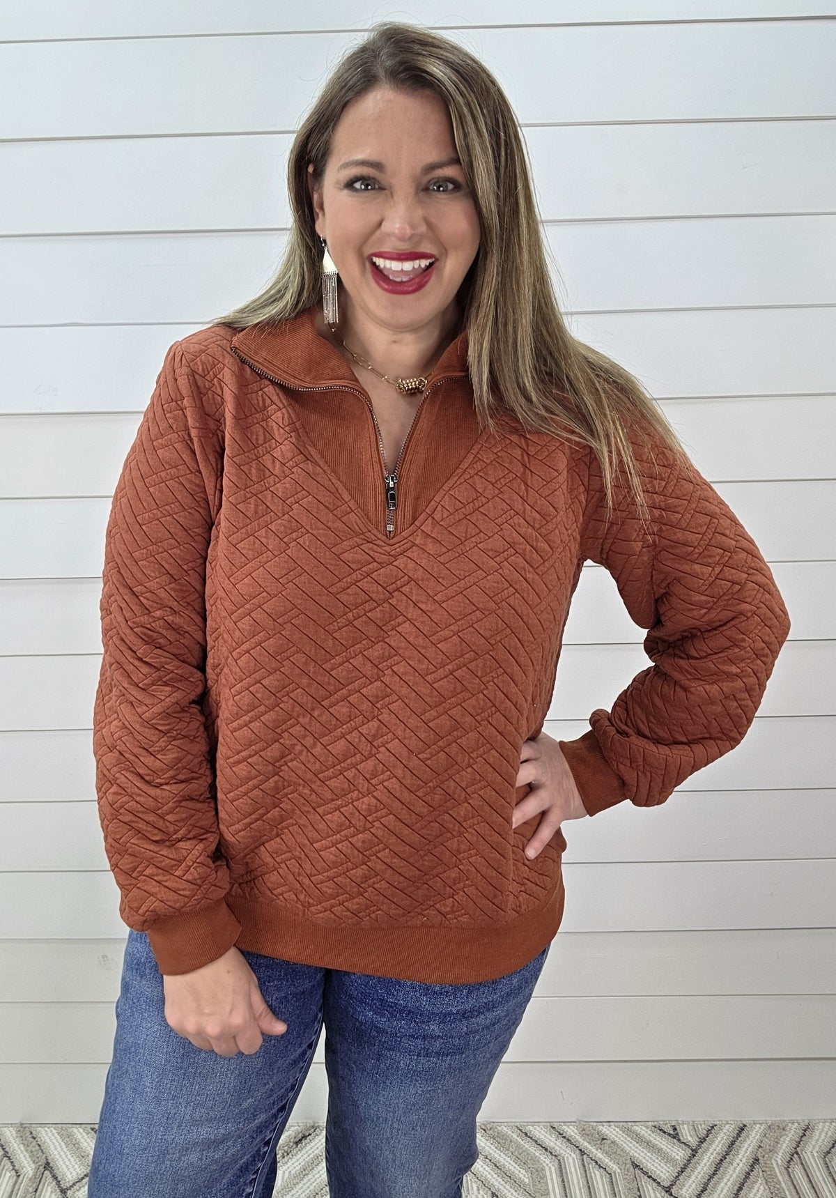 RUST QUILTED QUARTER ZIP PULLOVER