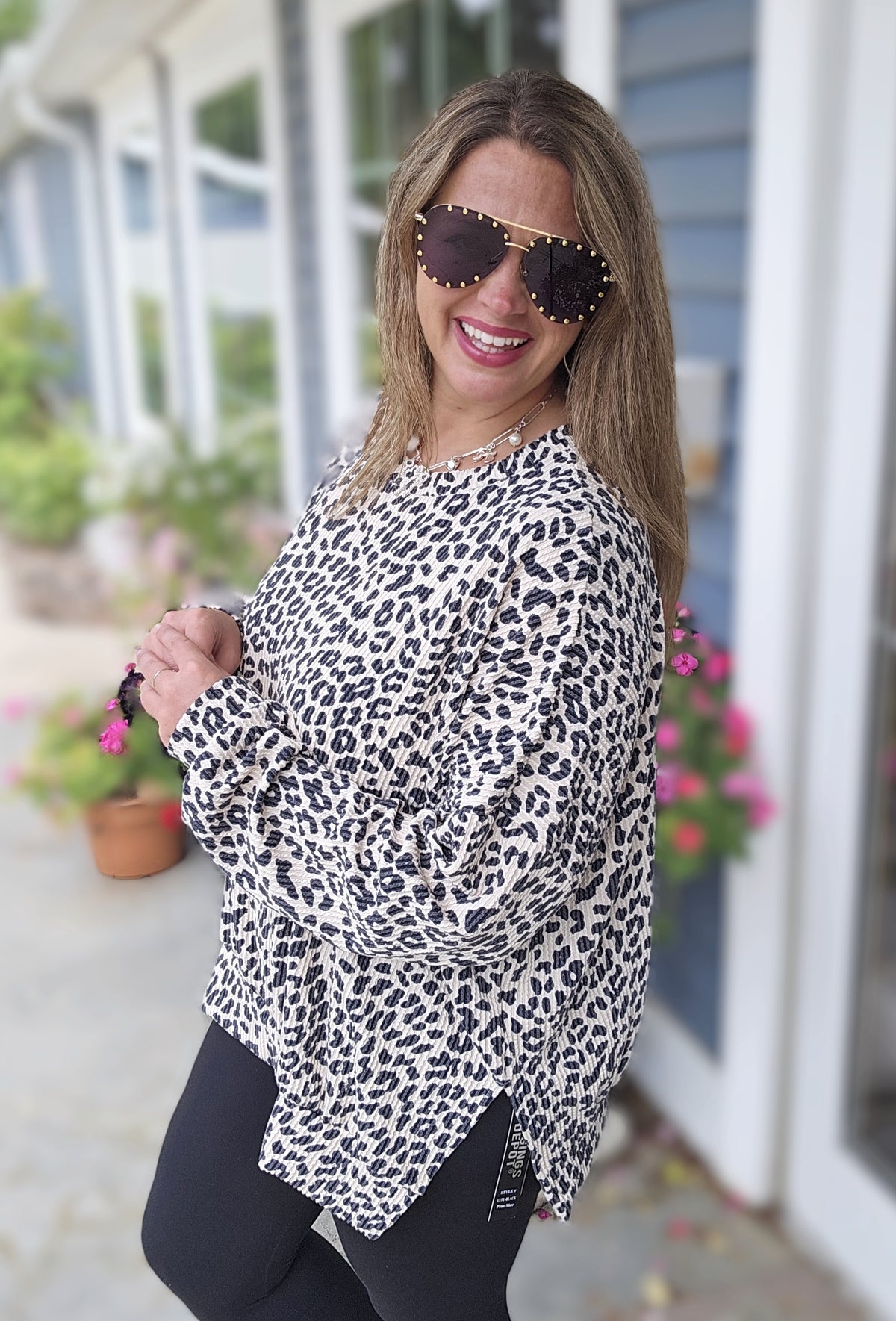 CREAM ANIMAL RAISED RIBBED SLIT BOTTOM LONG SLEEVE TOP