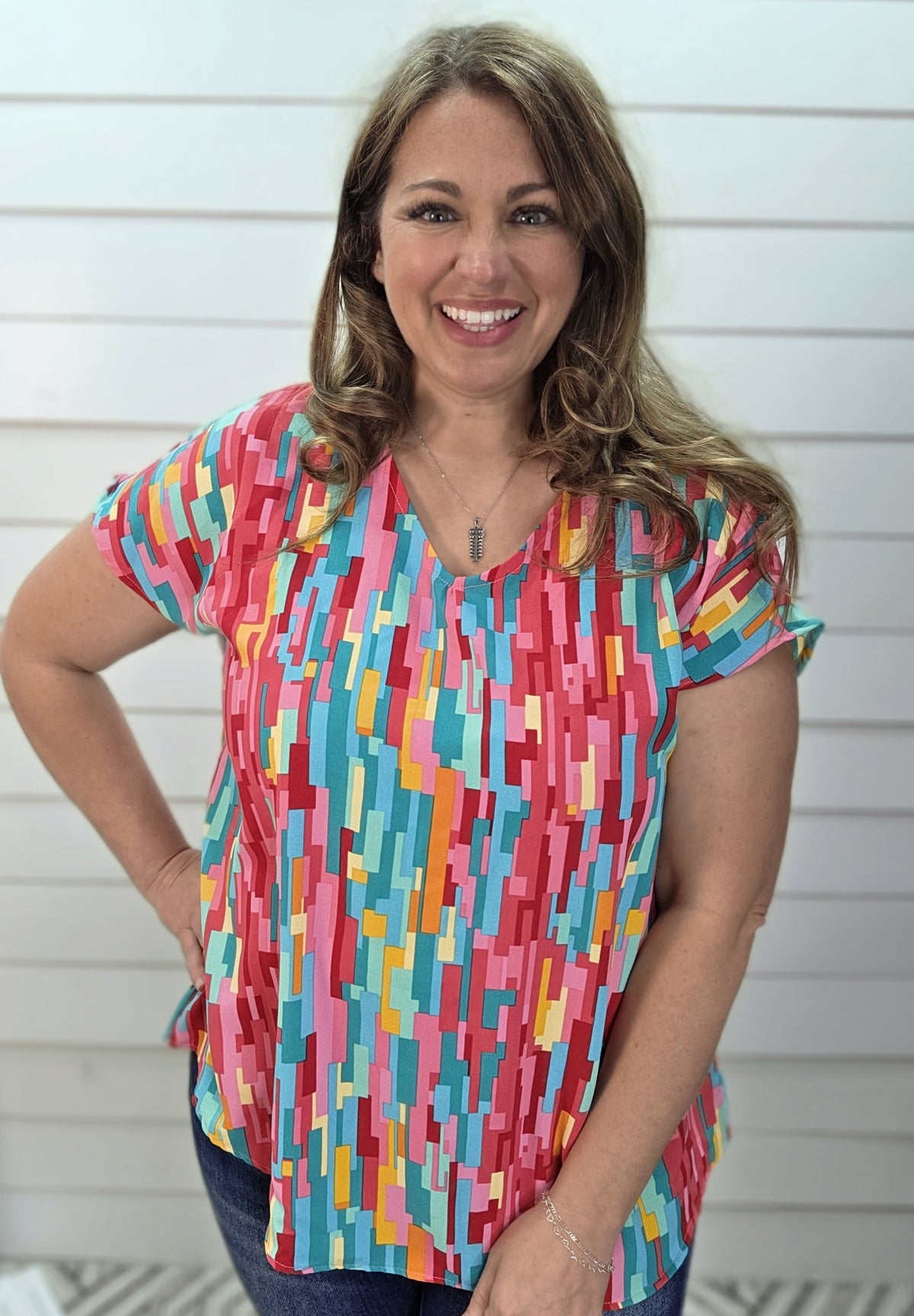 FUCSHIA/TEAL MULTI PRINT V NECK WOVEN TOP