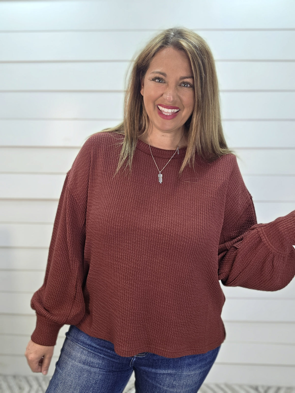 BURGUNDY TEXTURED EXPOSED SEAM LONG SLEEVE KNIT TOP