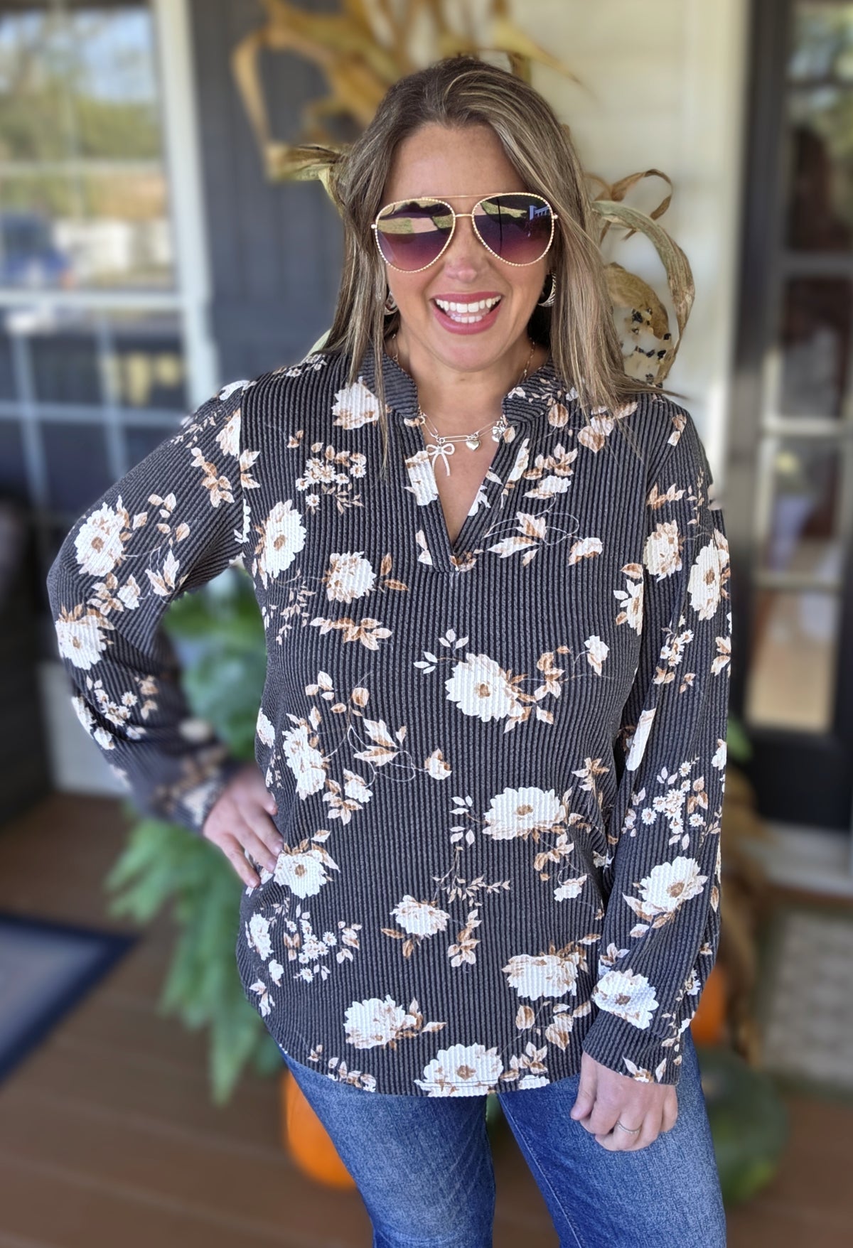 BLACK RAISED RIBBED FLORAL V NECK TOP