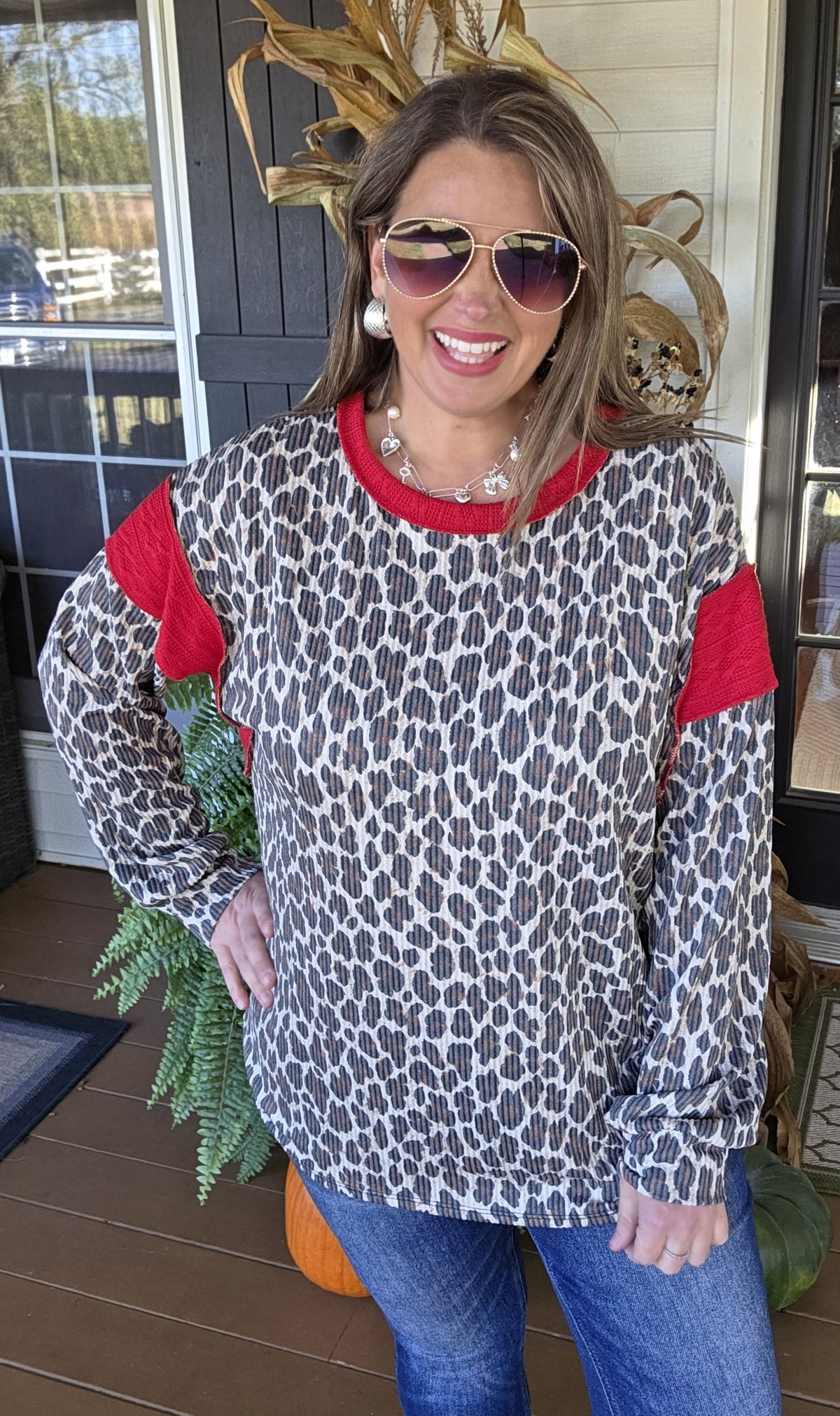 TAUPE ANIMAL PRINT RAISED RIBBED TOP WITH RED TRIM