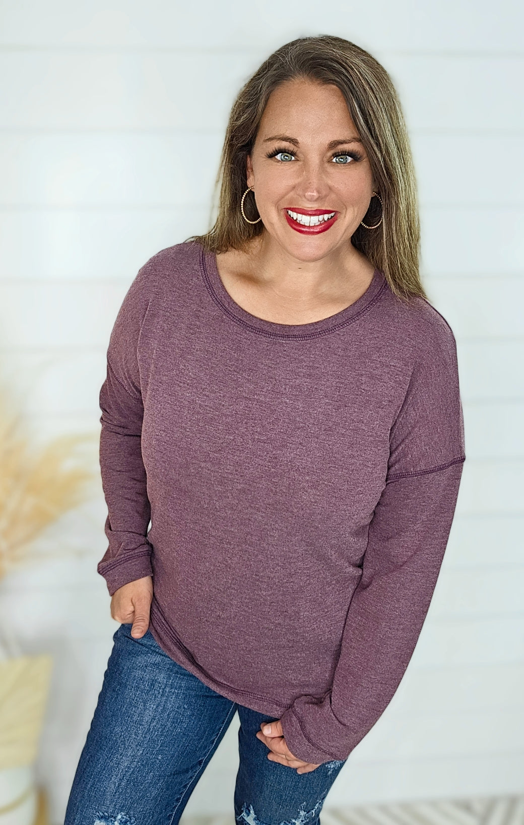 PLUM EXPOSED SEAM KNIT TOP