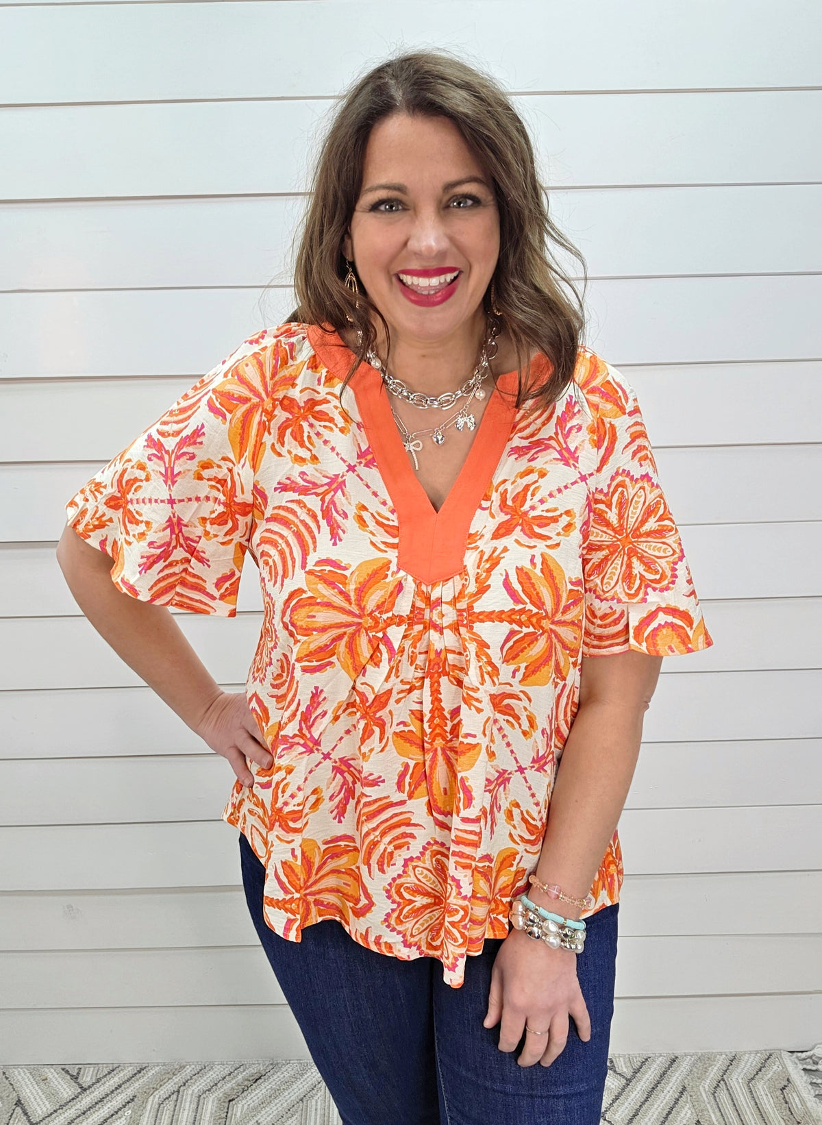 ORANGE FLORAL PRINT TOP W/ Y NECK LINE AND FLUTTER SLEEVE