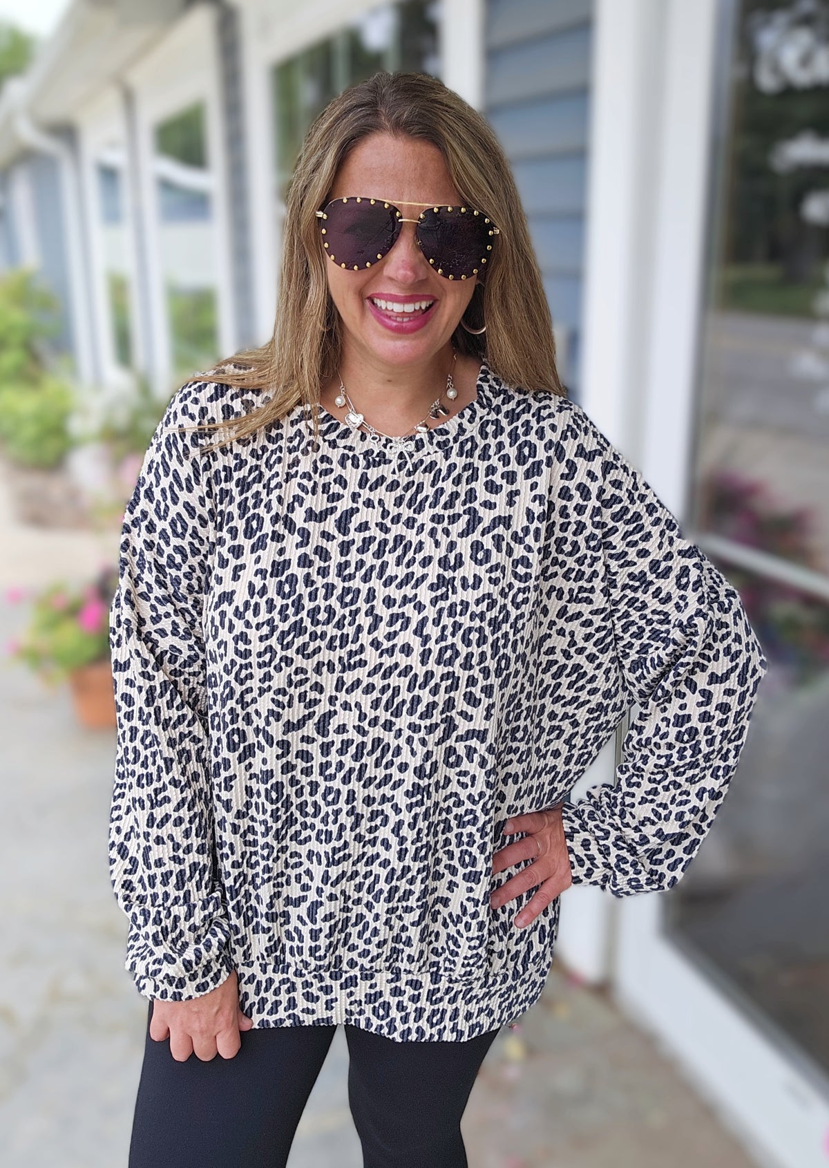 CREAM ANIMAL RAISED RIBBED SLIT BOTTOM LONG SLEEVE TOP