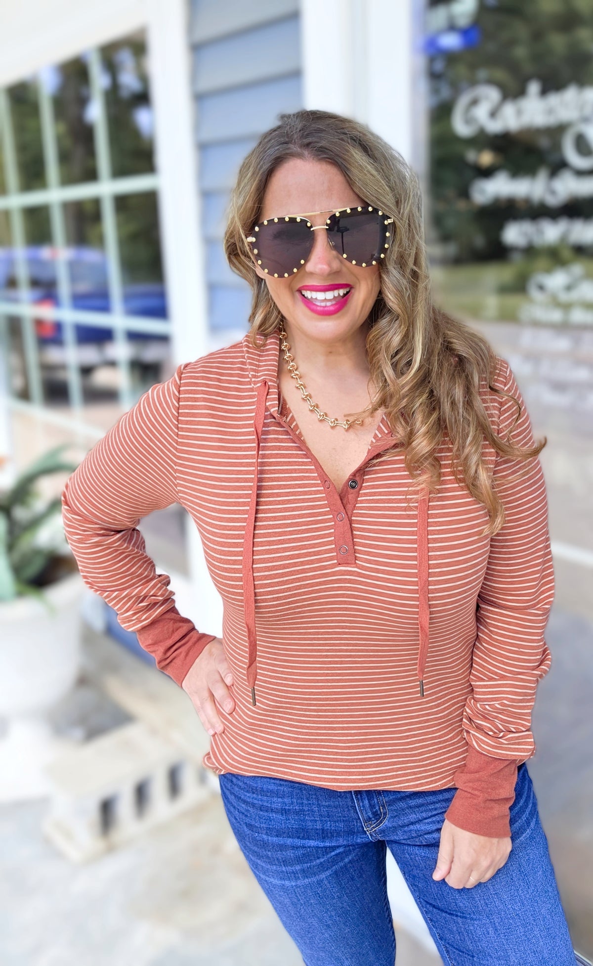 RUST STRIPED SNAP BUTTON HENLEY HOODED KNIT TOP