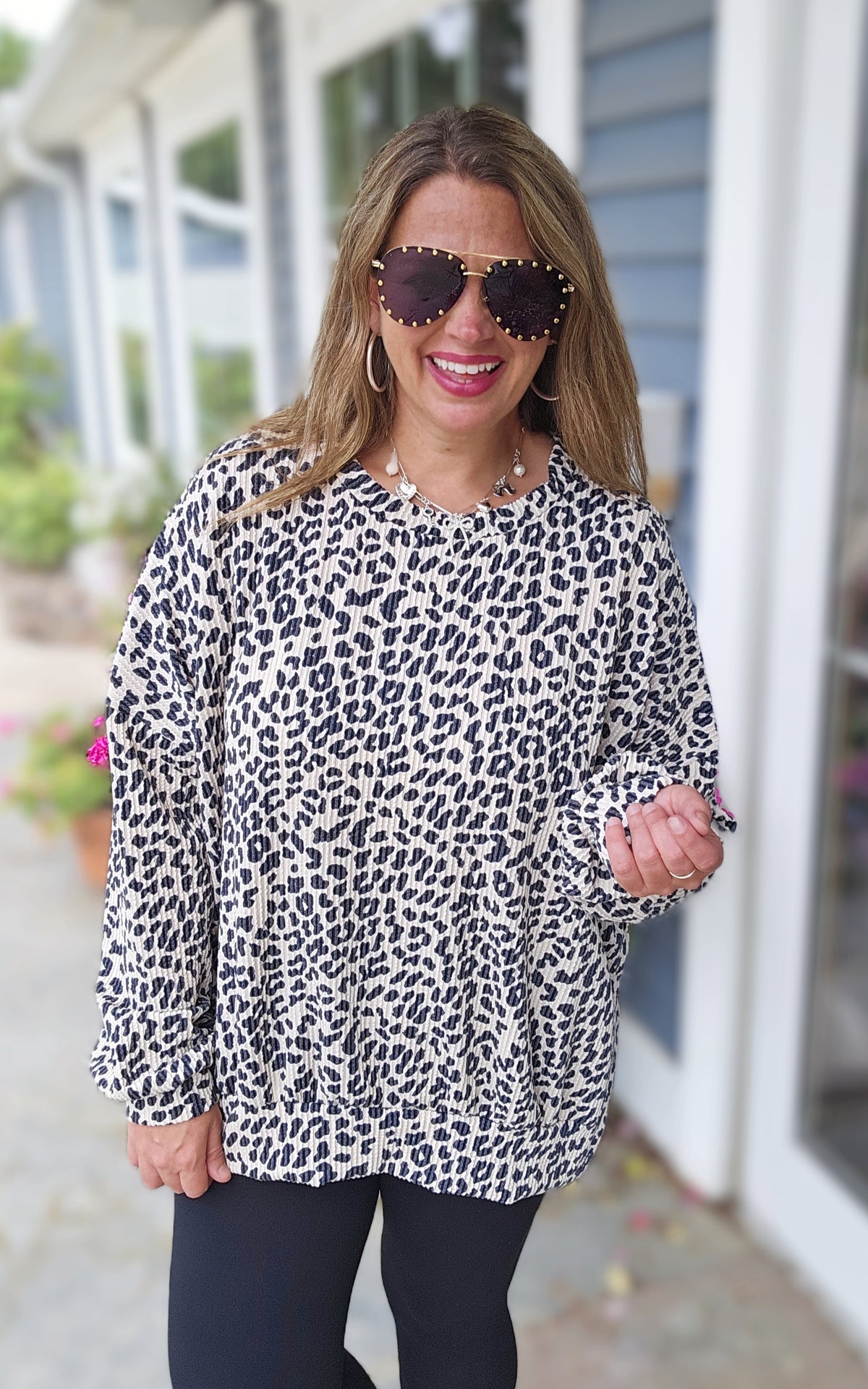 CREAM ANIMAL RAISED RIBBED SLIT BOTTOM LONG SLEEVE TOP