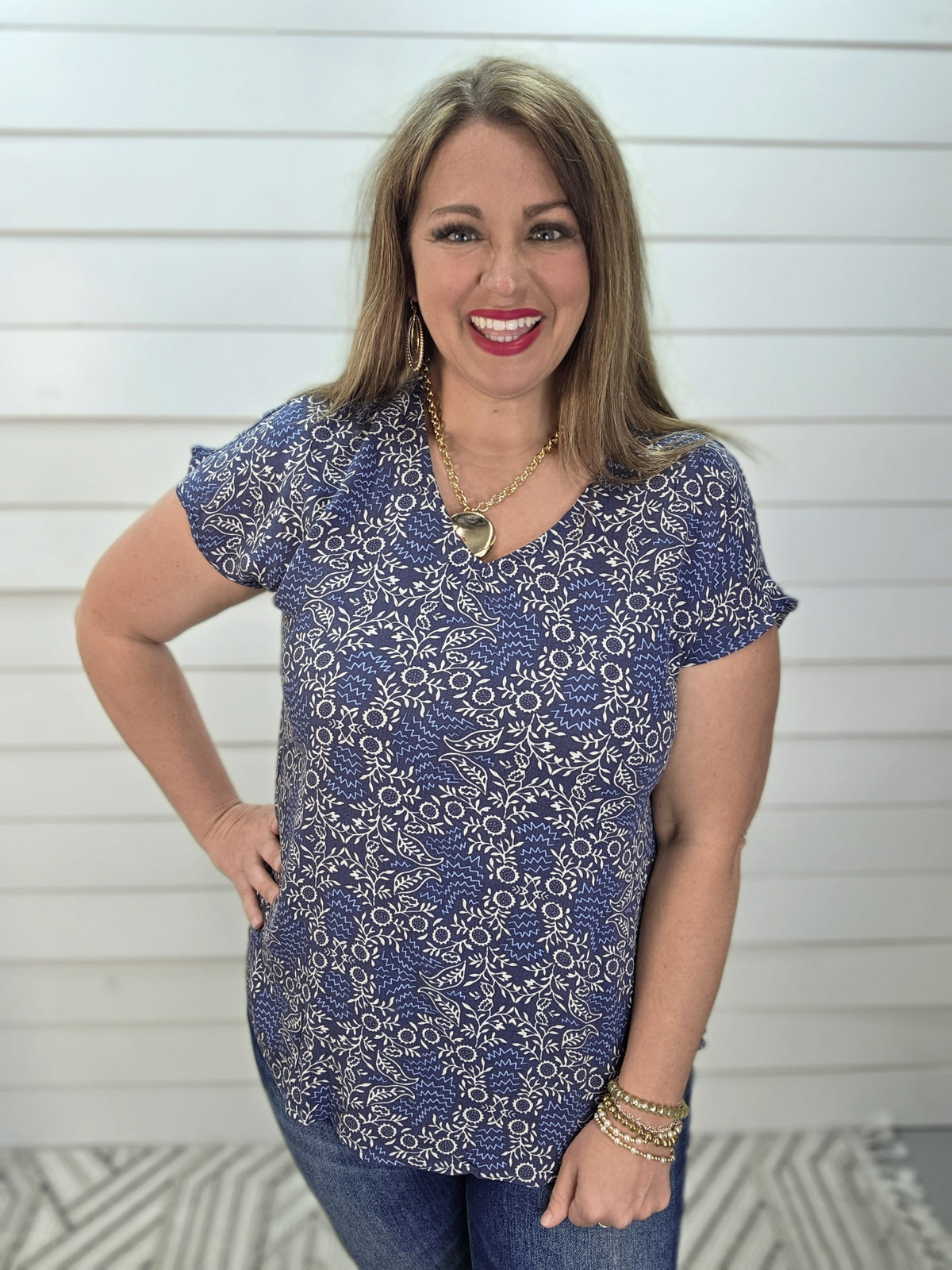 NAVY FLORAL V NECK WOVEN TOP