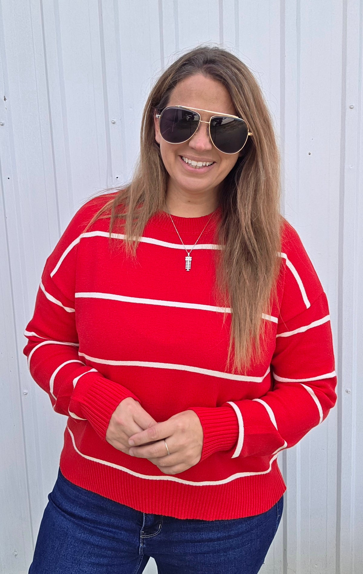 RED STRIPED KNIT SWEATER