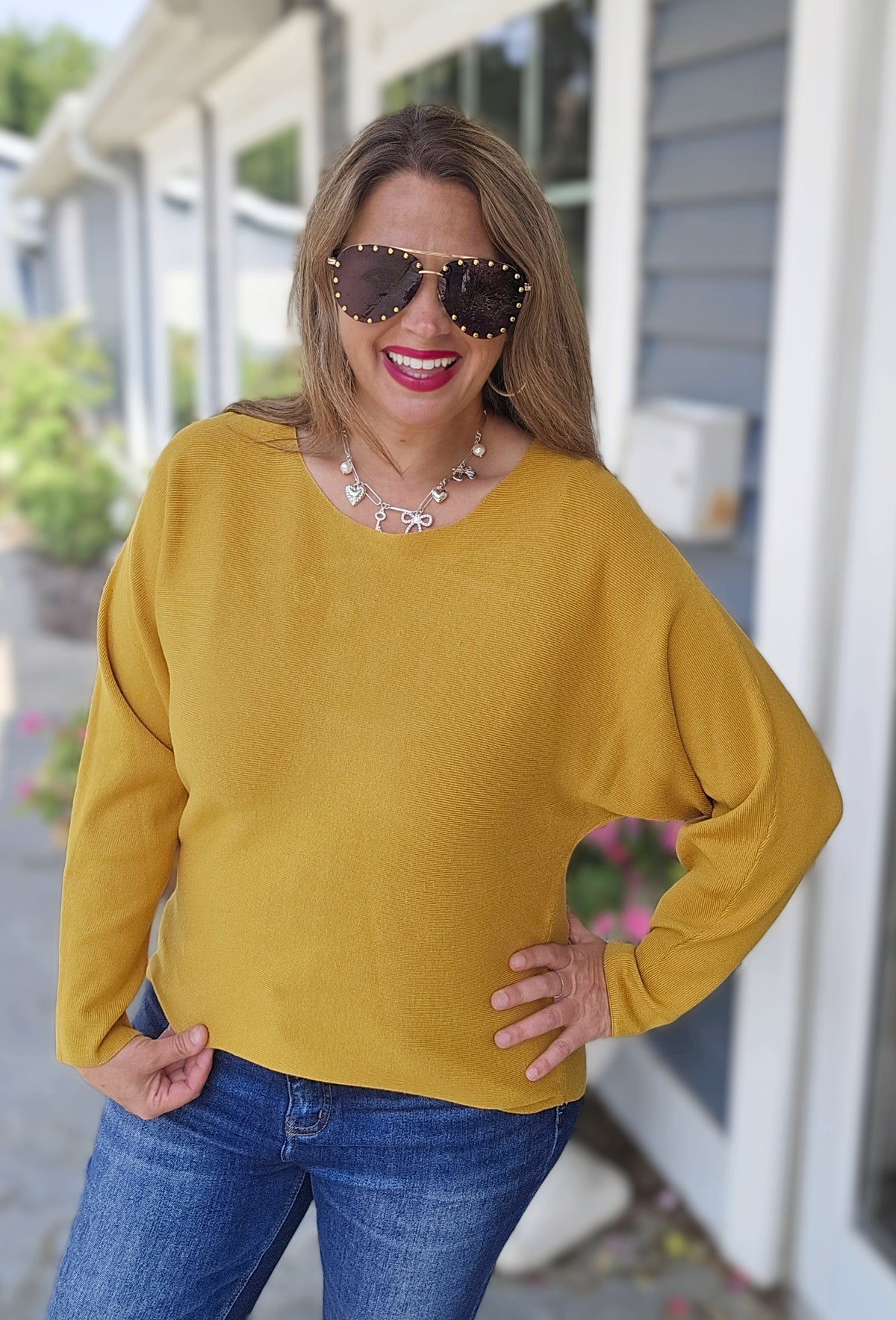 YELLOW BUTTON BACK KNIT CURVED HEM TOP