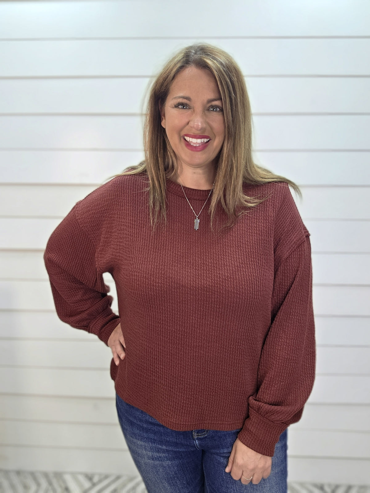 BURGUNDY TEXTURED EXPOSED SEAM LONG SLEEVE KNIT TOP