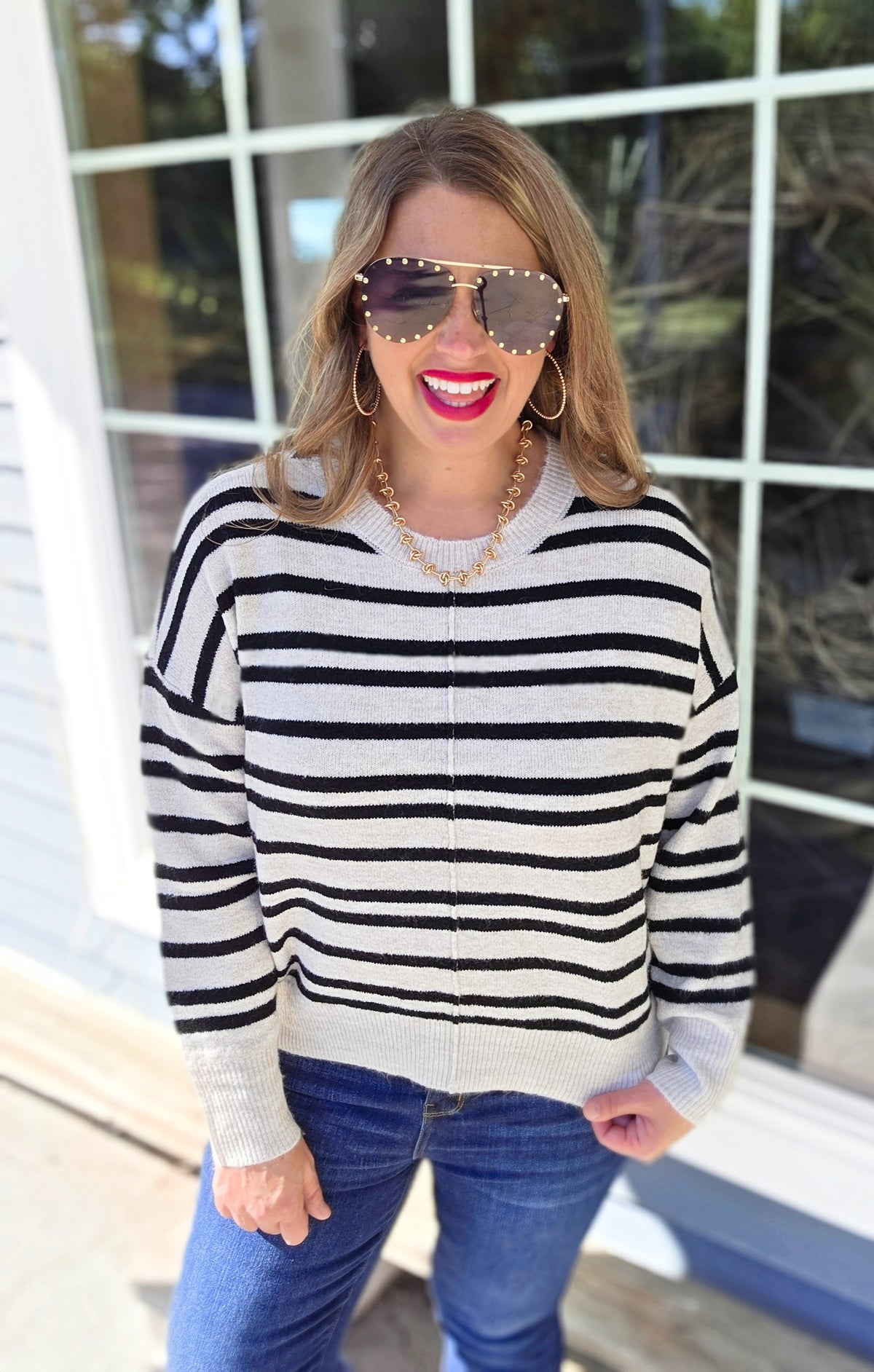 CREAM/BLACK STRIPED KNIT SWEATER