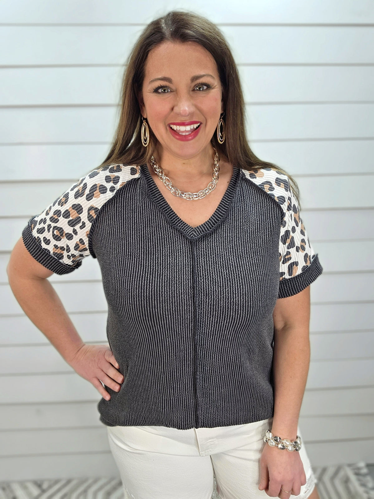 BLACK RAISED RIBBED KNIT TOP W/ LEOPARD SLEEVES AND CENTER SEAM