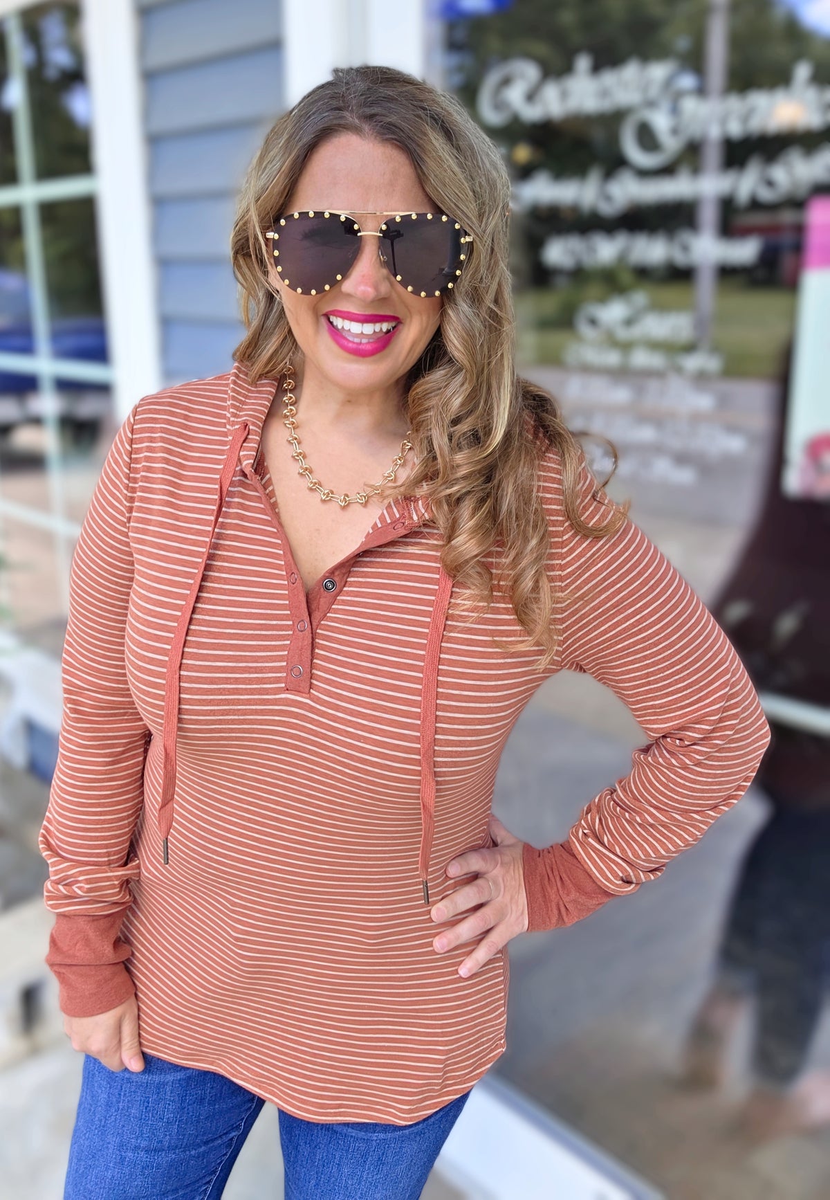 RUST STRIPED SNAP BUTTON HENLEY HOODED KNIT TOP