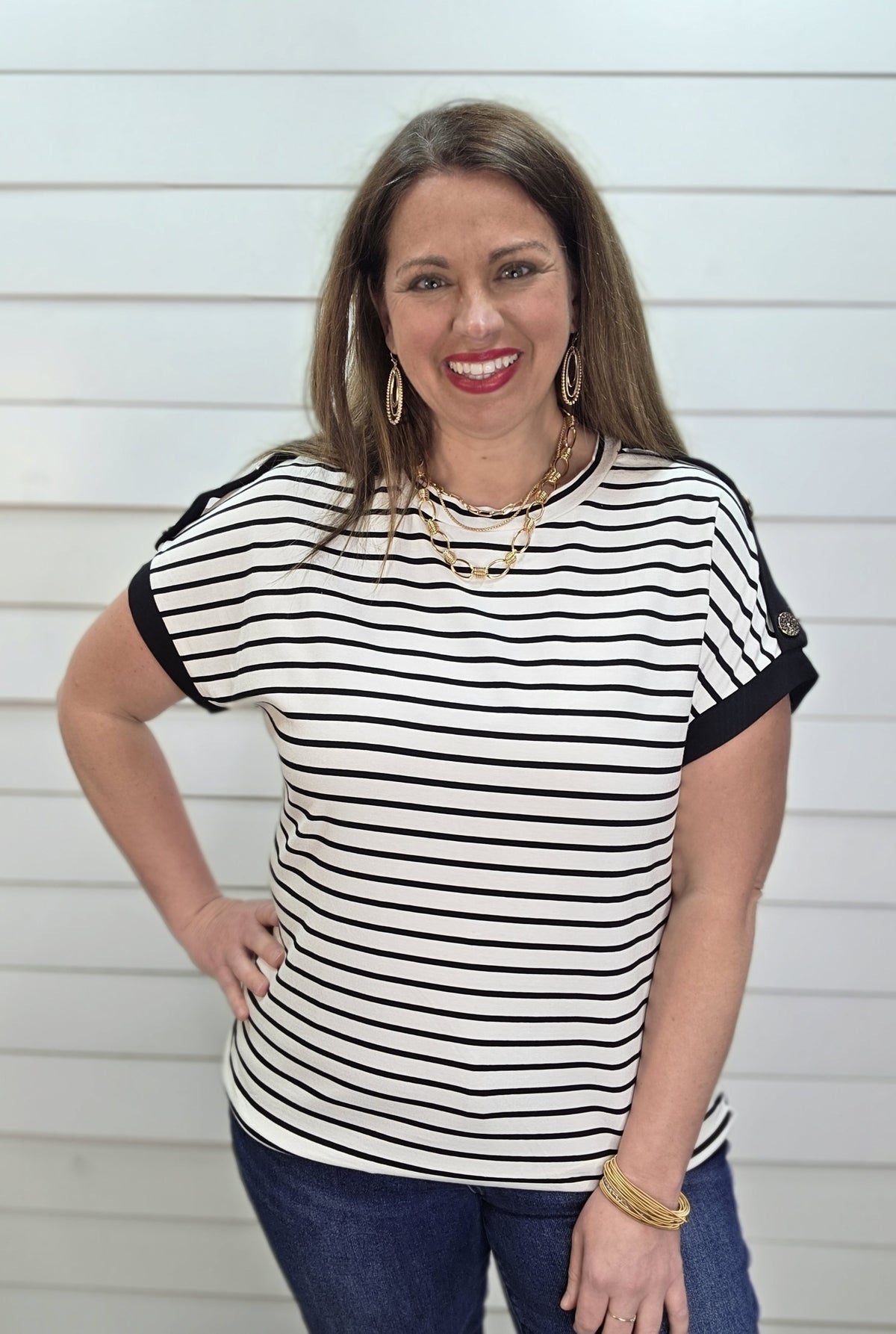 BLACK/WHITE STRIPED KNIT TOP W/ BUTTON SLEEVE DETAILS
