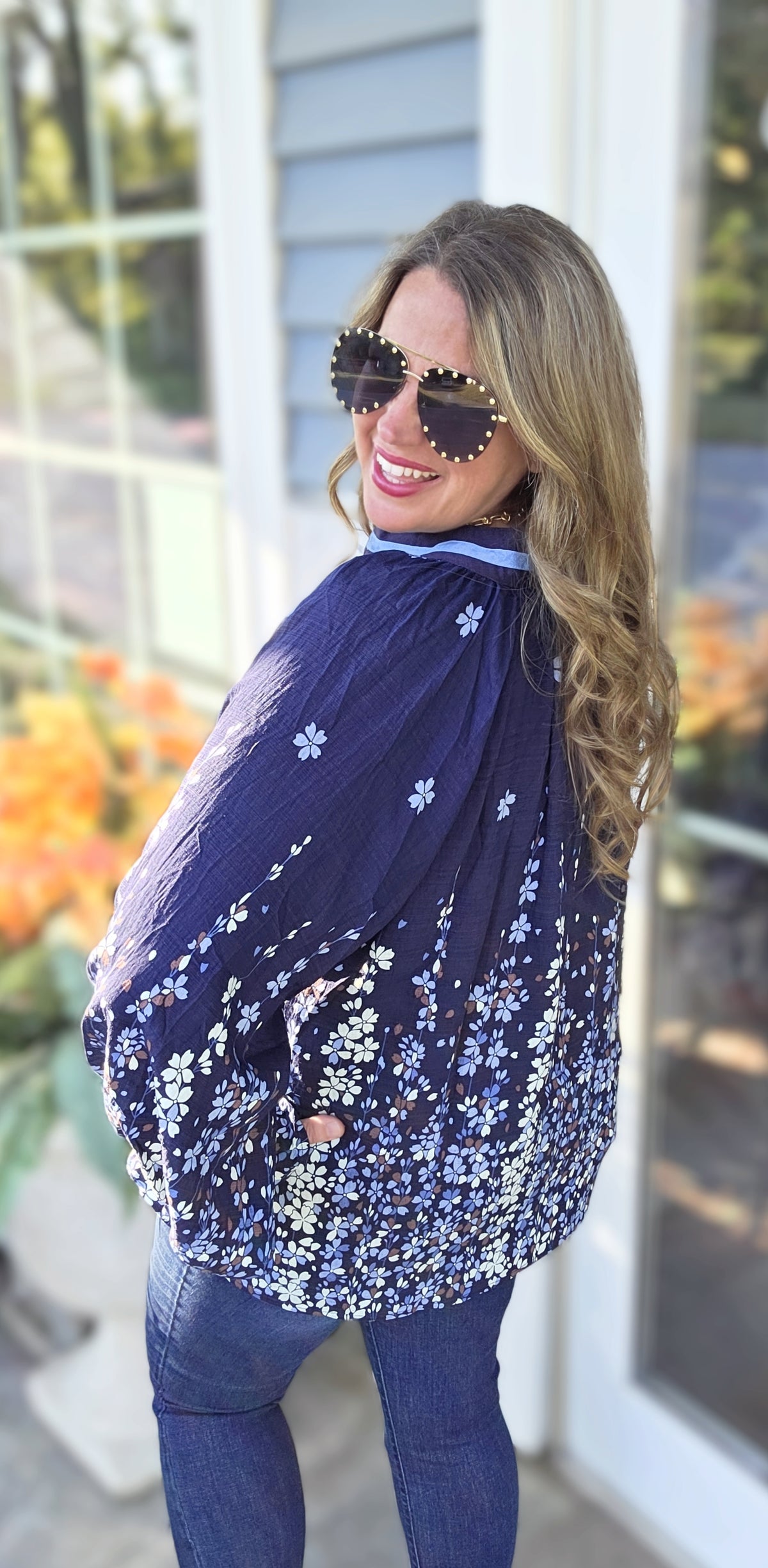 NAVY FLORAL V NECK WOVEN TOP